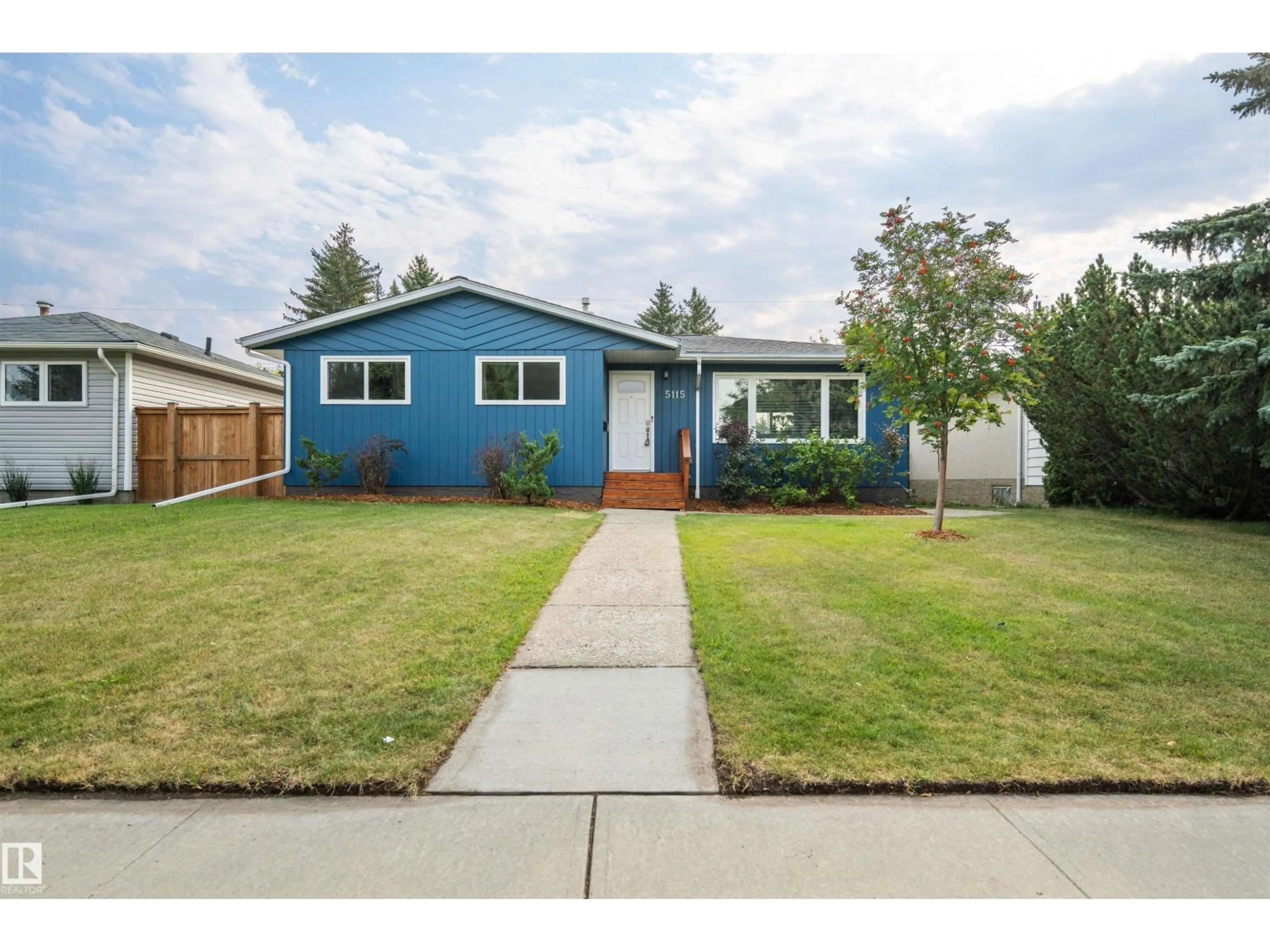 Home with vinyl exterior material, street for NW - 5115 114B ST, Edmonton Alberta T6H3N4