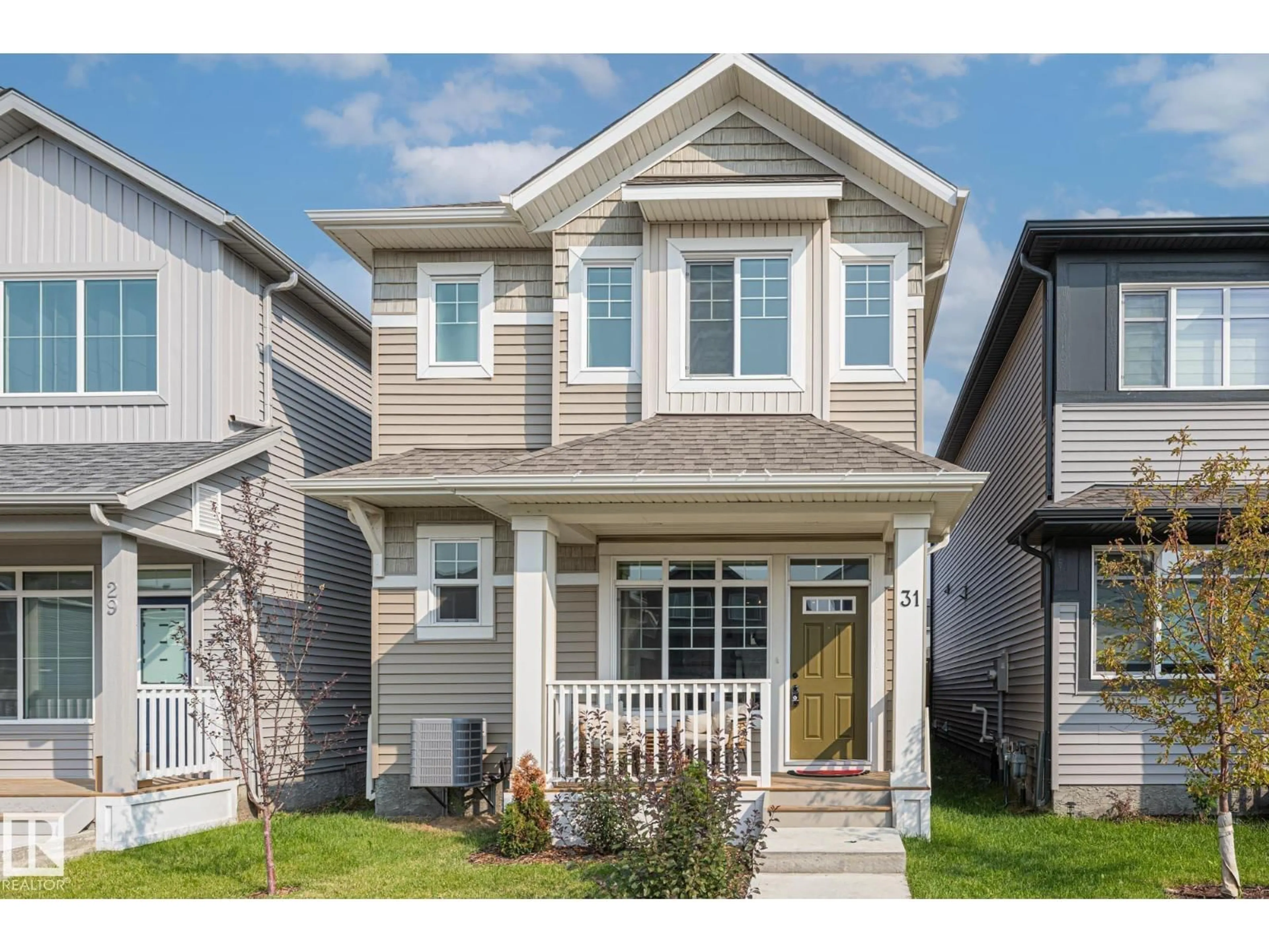 Home with vinyl exterior material, street for 31 DORAIS WY, Fort Saskatchewan Alberta T8L0X3