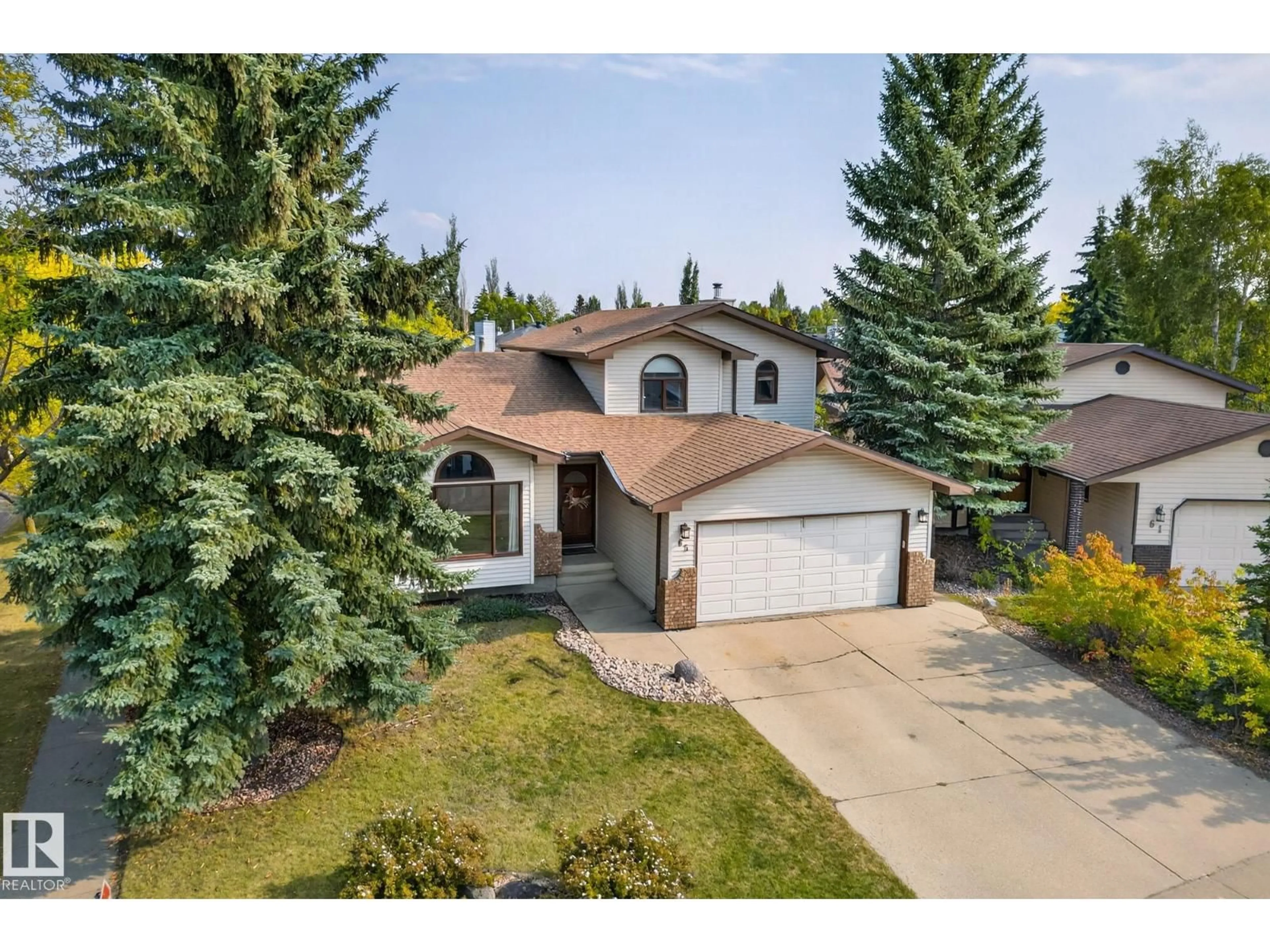 A pic from outside/outdoor area/front of a property/back of a property/a pic from drone, street for 65 PRIMROSE BV, Sherwood Park Alberta T8H1G1