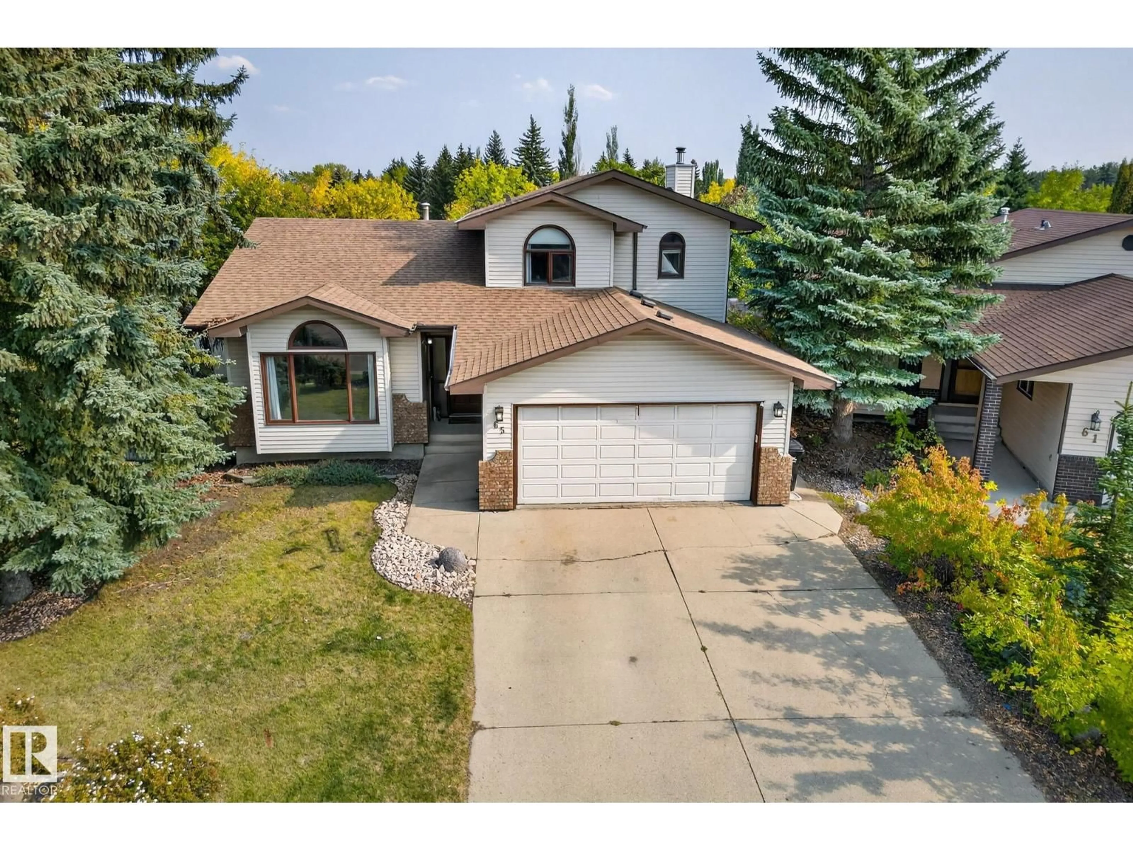 A pic from outside/outdoor area/front of a property/back of a property/a pic from drone, street for 65 PRIMROSE BV, Sherwood Park Alberta T8H1G1