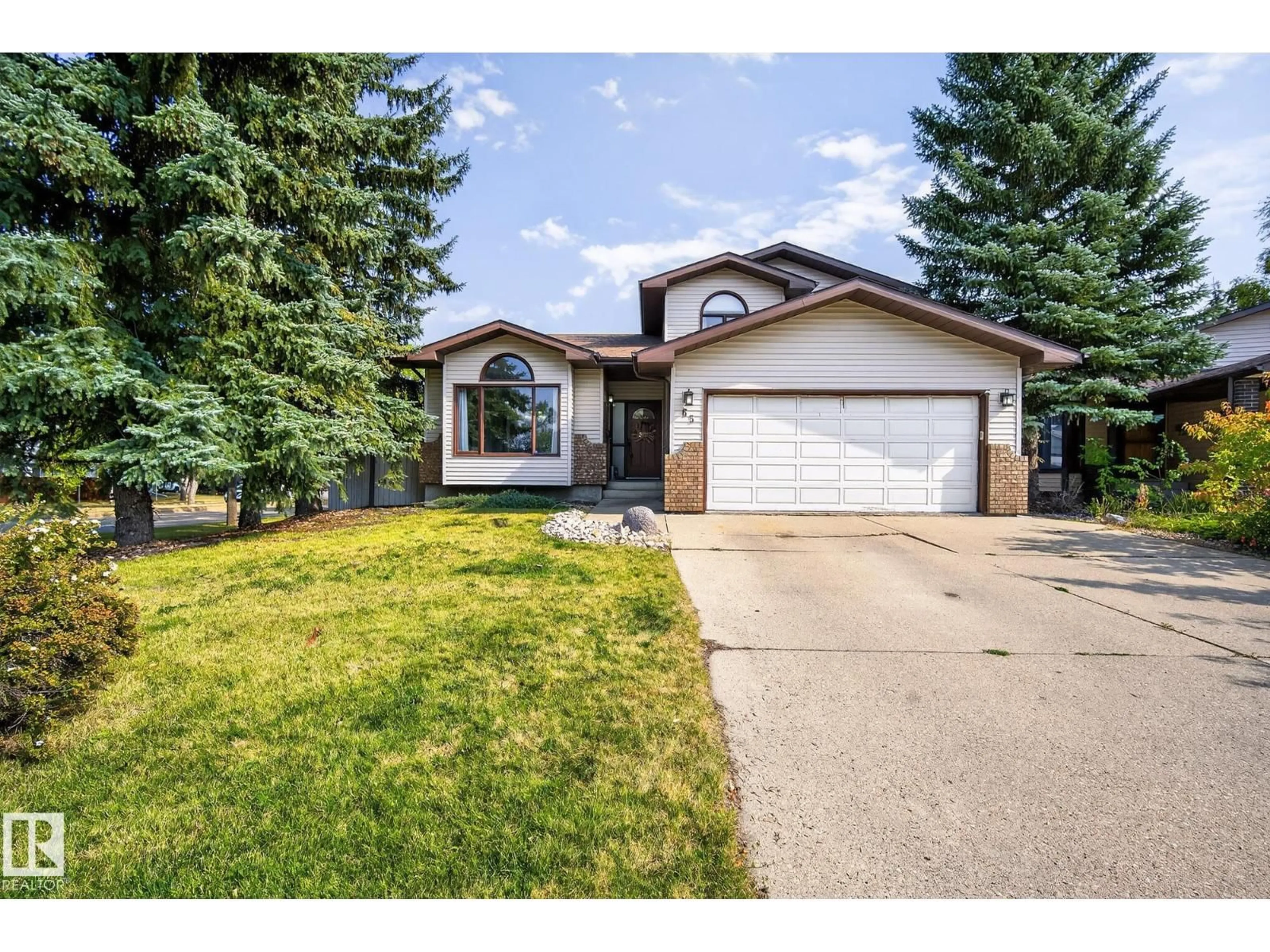 Home with vinyl exterior material, street for 65 PRIMROSE BV, Sherwood Park Alberta T8H1G1
