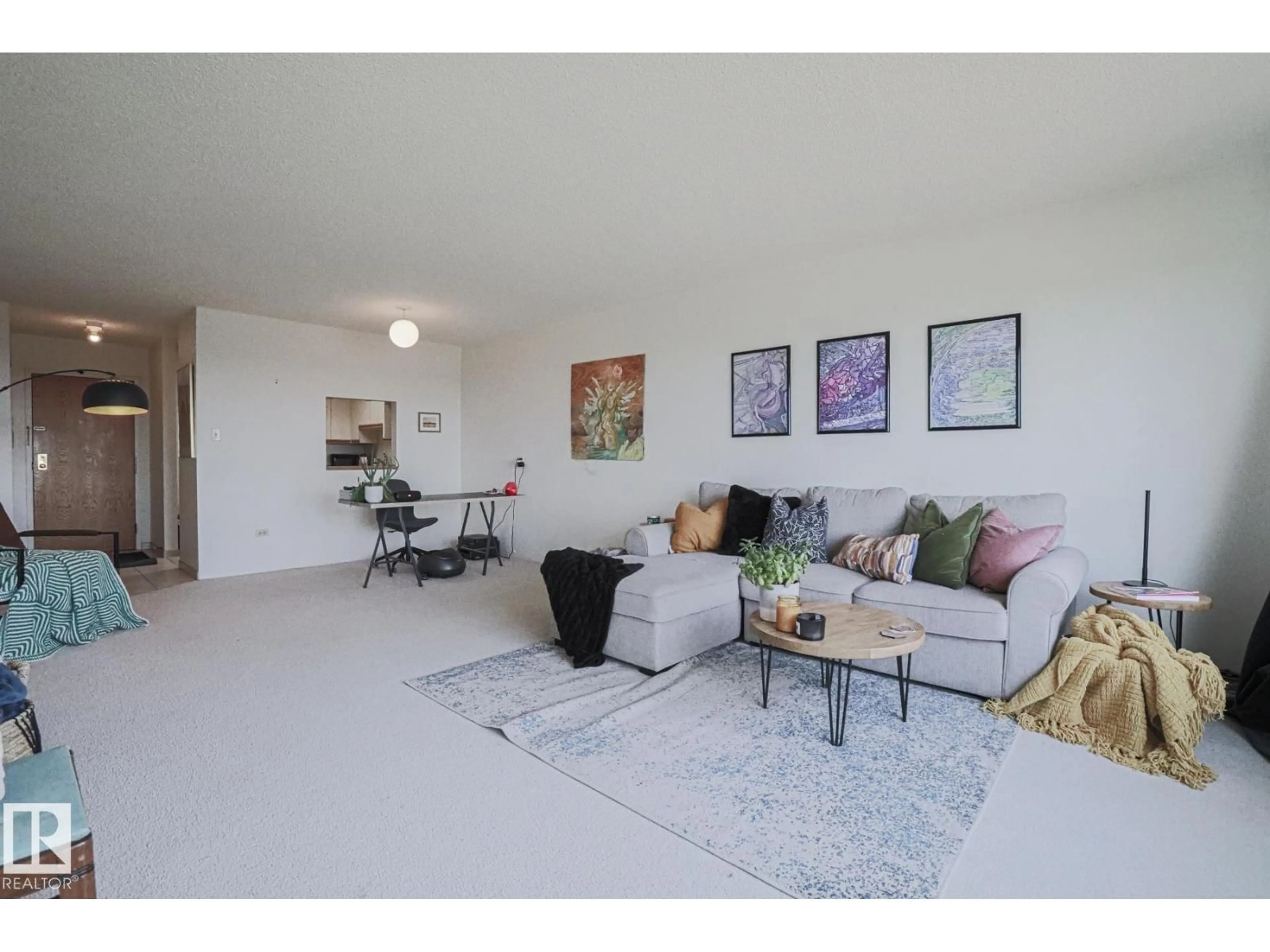 Living room with furniture, unknown for 10011 - 2103 123 ST, Edmonton Alberta T5N1M9