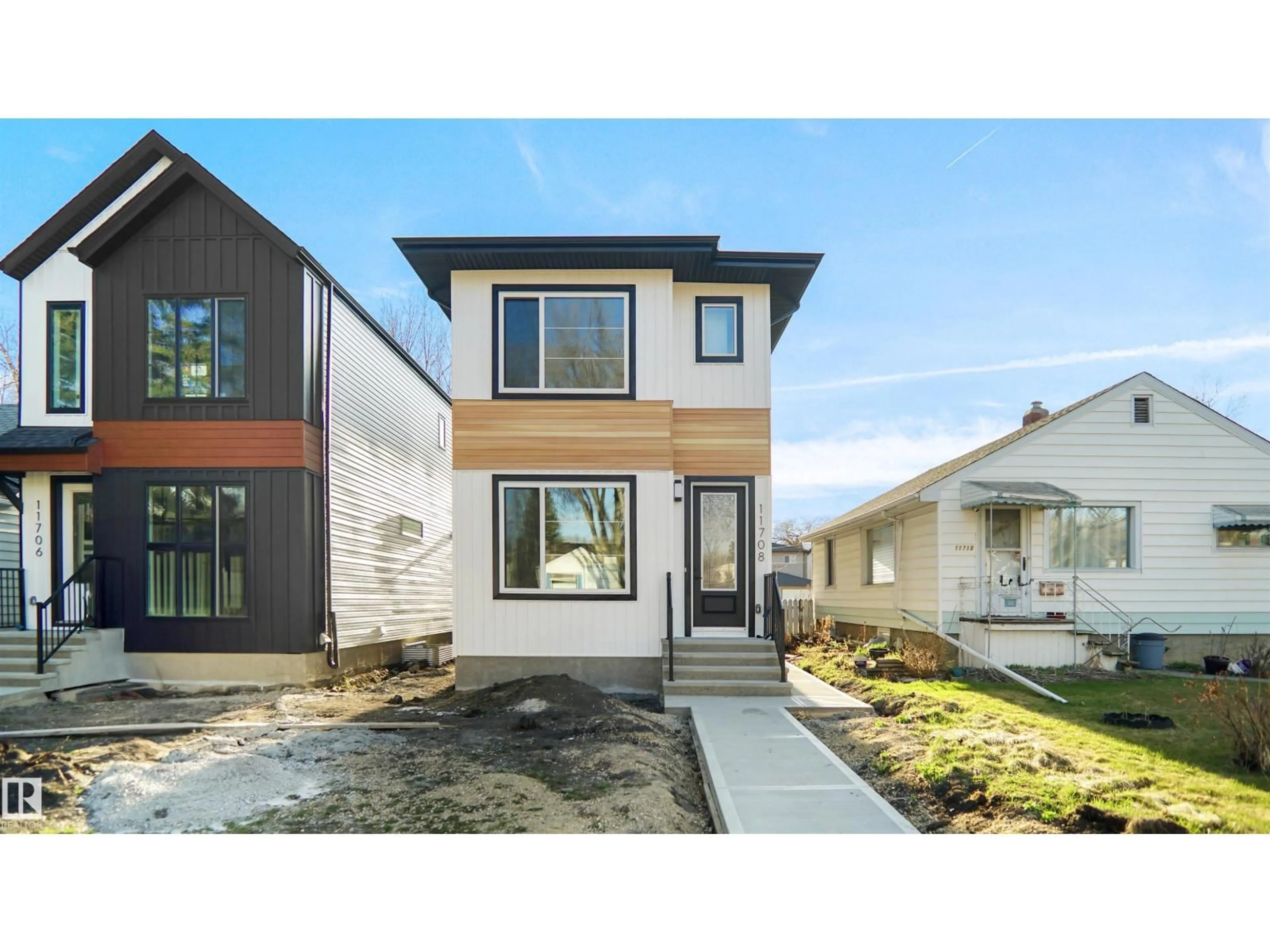 Home with vinyl exterior material, street for NW - 11708 126 ST, Edmonton Alberta T5M0S2