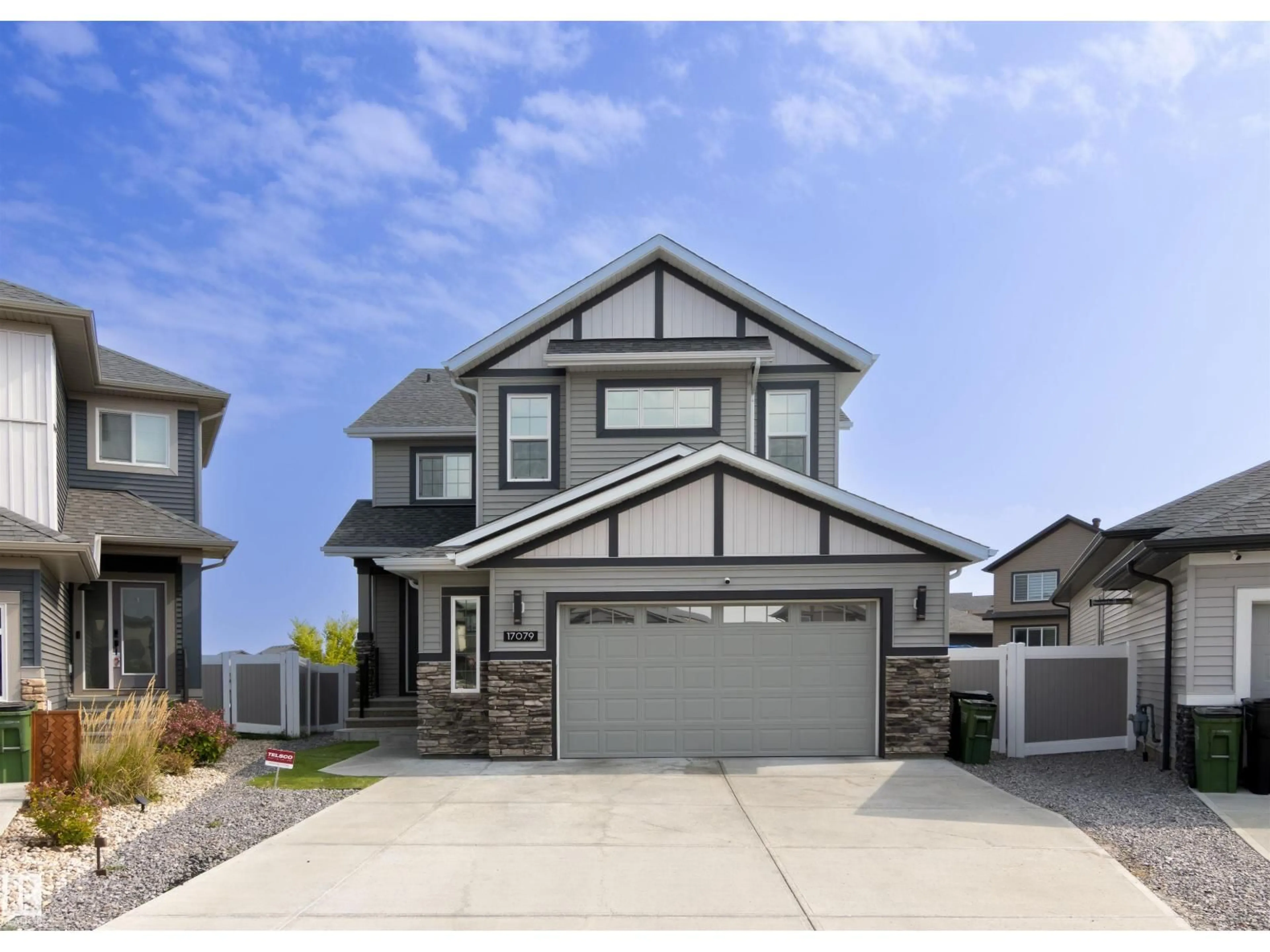 Home with vinyl exterior material, street for NW - 17079 46 ST, Edmonton Alberta T5Y4B1