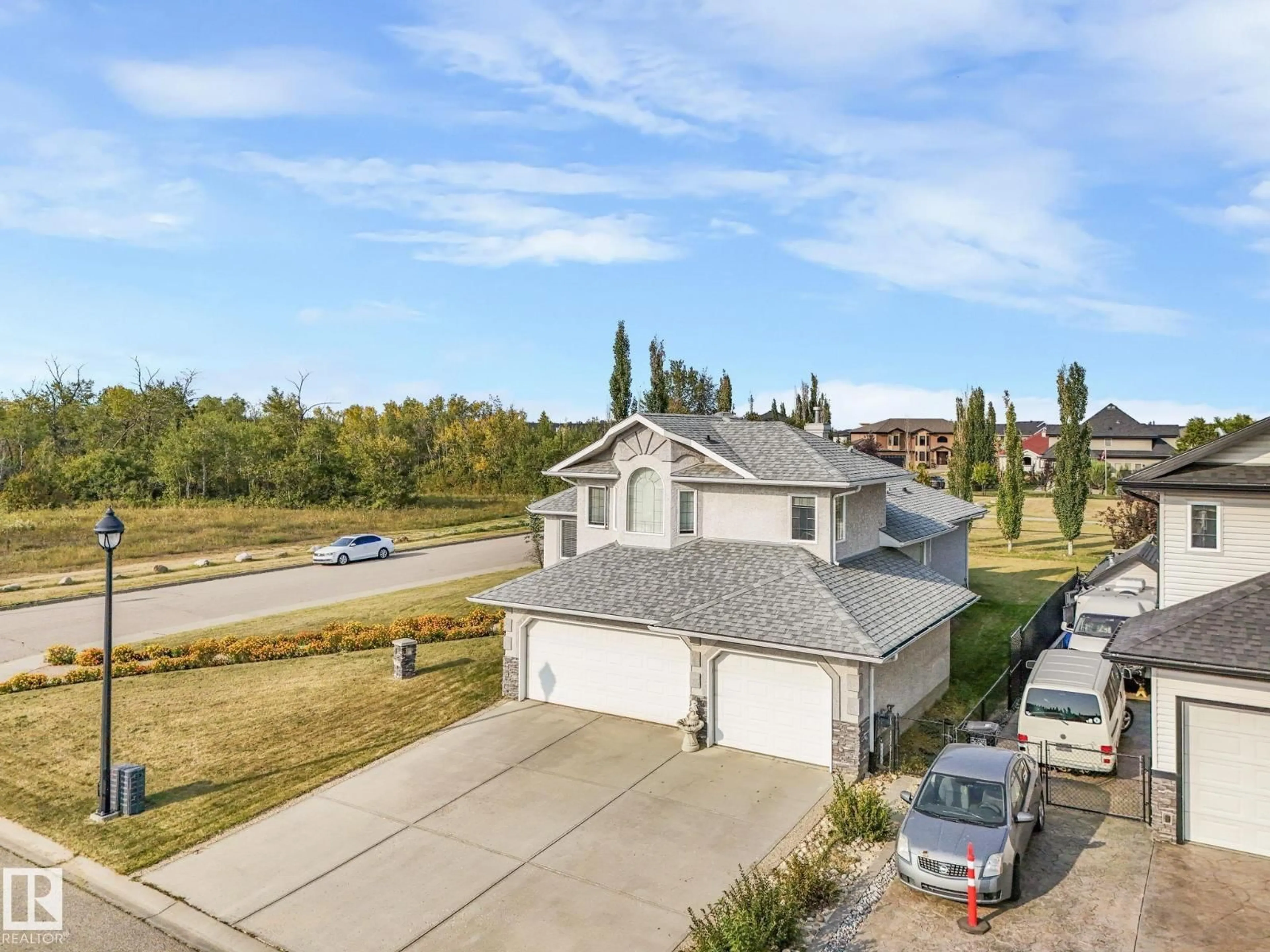 A pic from outside/outdoor area/front of a property/back of a property/a pic from drone, street for NE - 16239 2 ST, Edmonton Alberta T5Y3K6