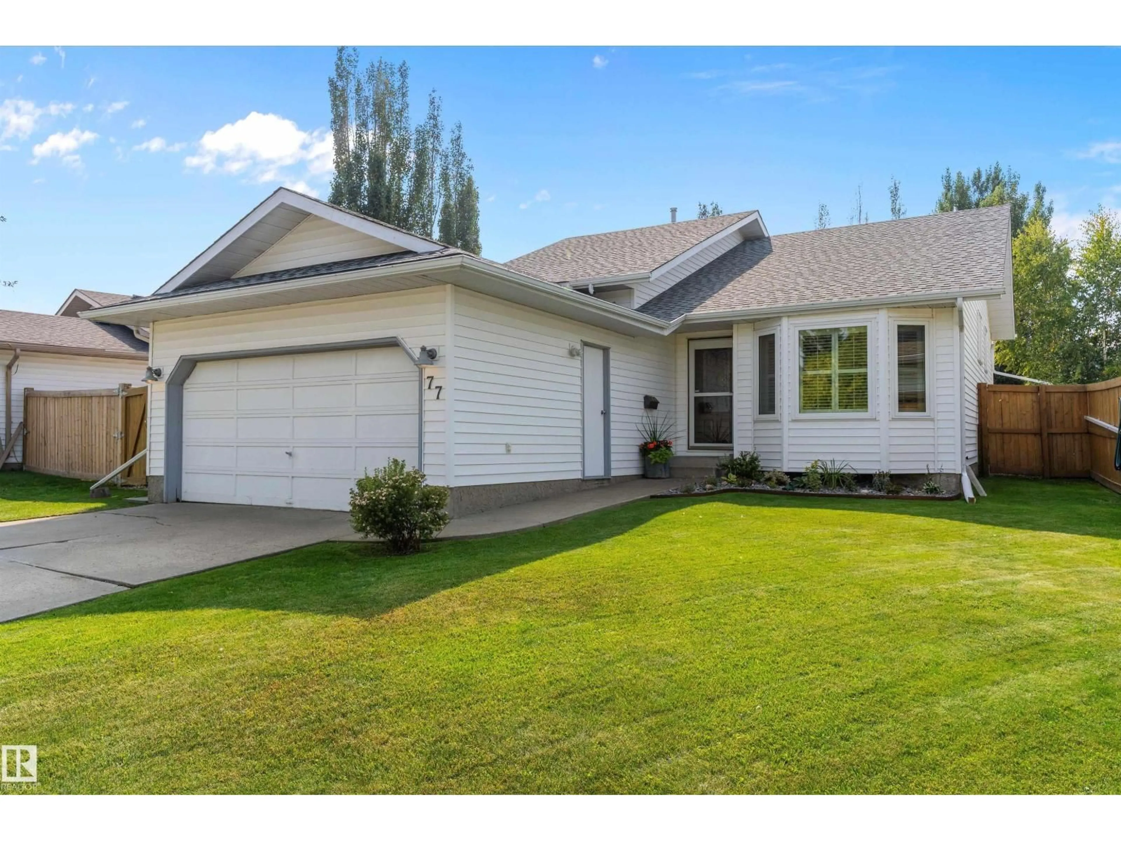 Home with vinyl exterior material, street for 77 MEADOWVIEW DR, Leduc Alberta T9E6N6