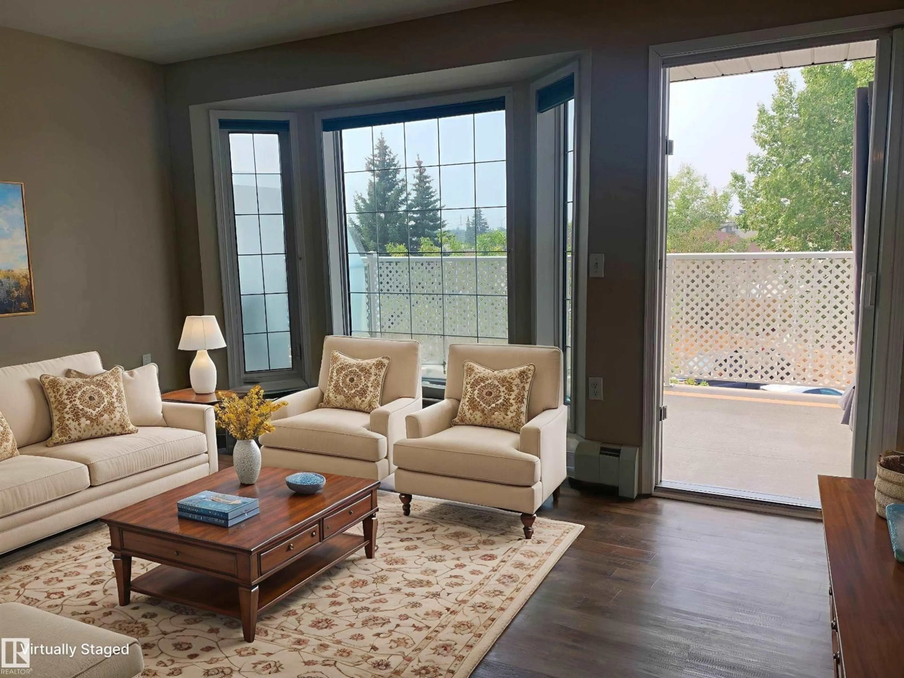 Living room with furniture, wood/laminate floor for 362 13441 127 ST NW, Edmonton Alberta T5L5B6