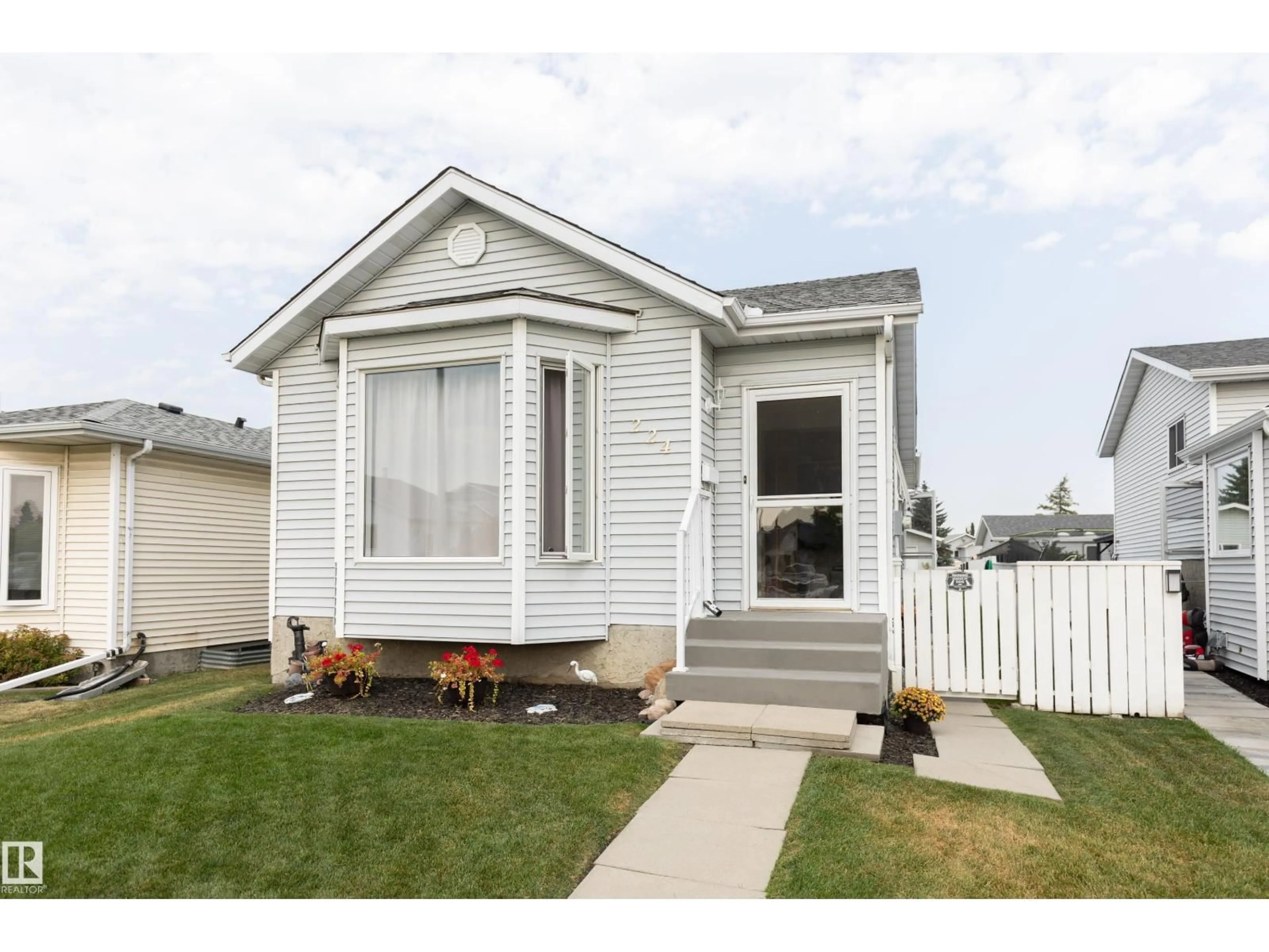 Home with vinyl exterior material, street for 224 KIRKWOOD AV, Edmonton Alberta T6L5A8
