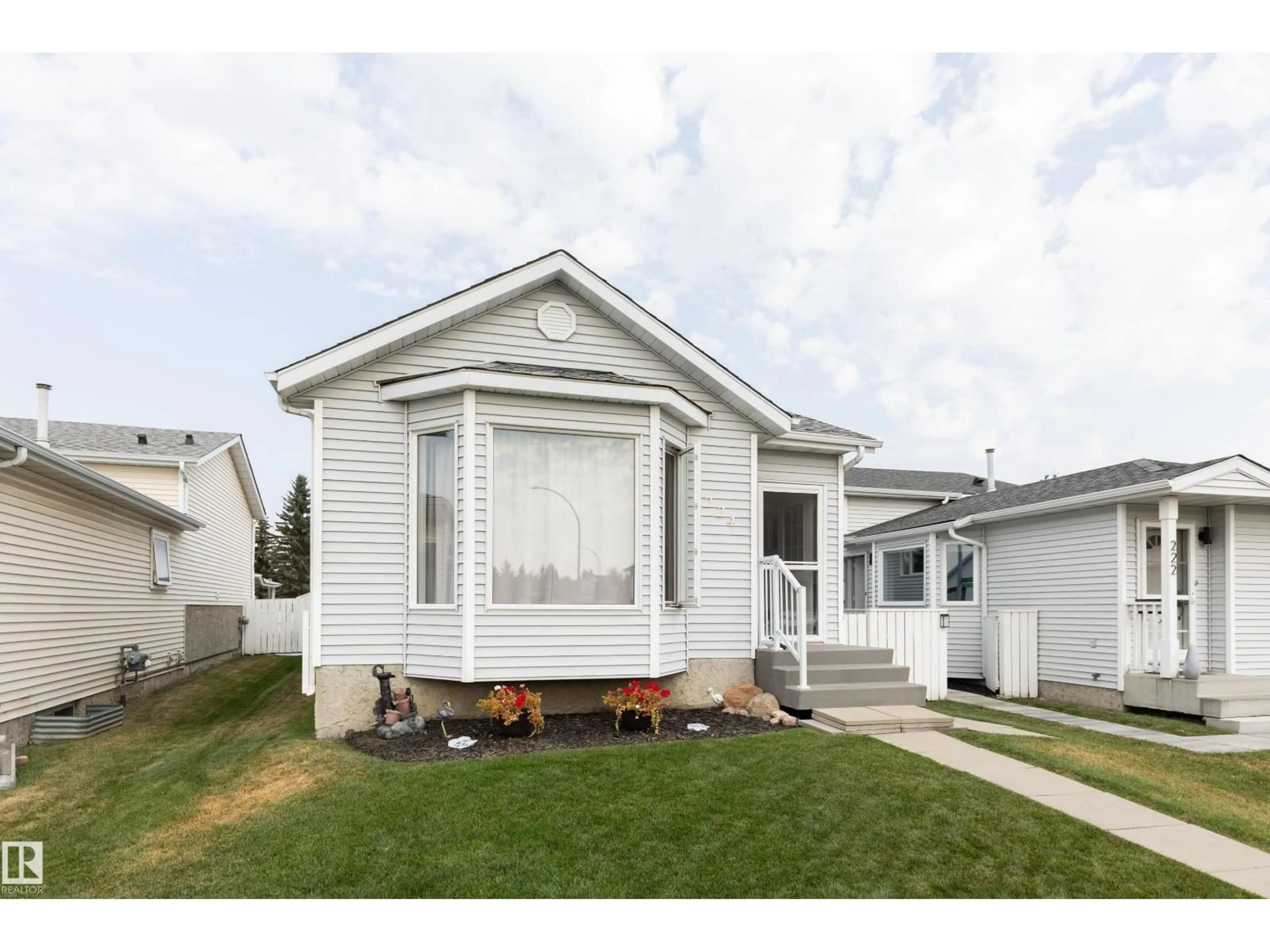 Home with vinyl exterior material, street for 224 KIRKWOOD AV, Edmonton Alberta T6L5A8