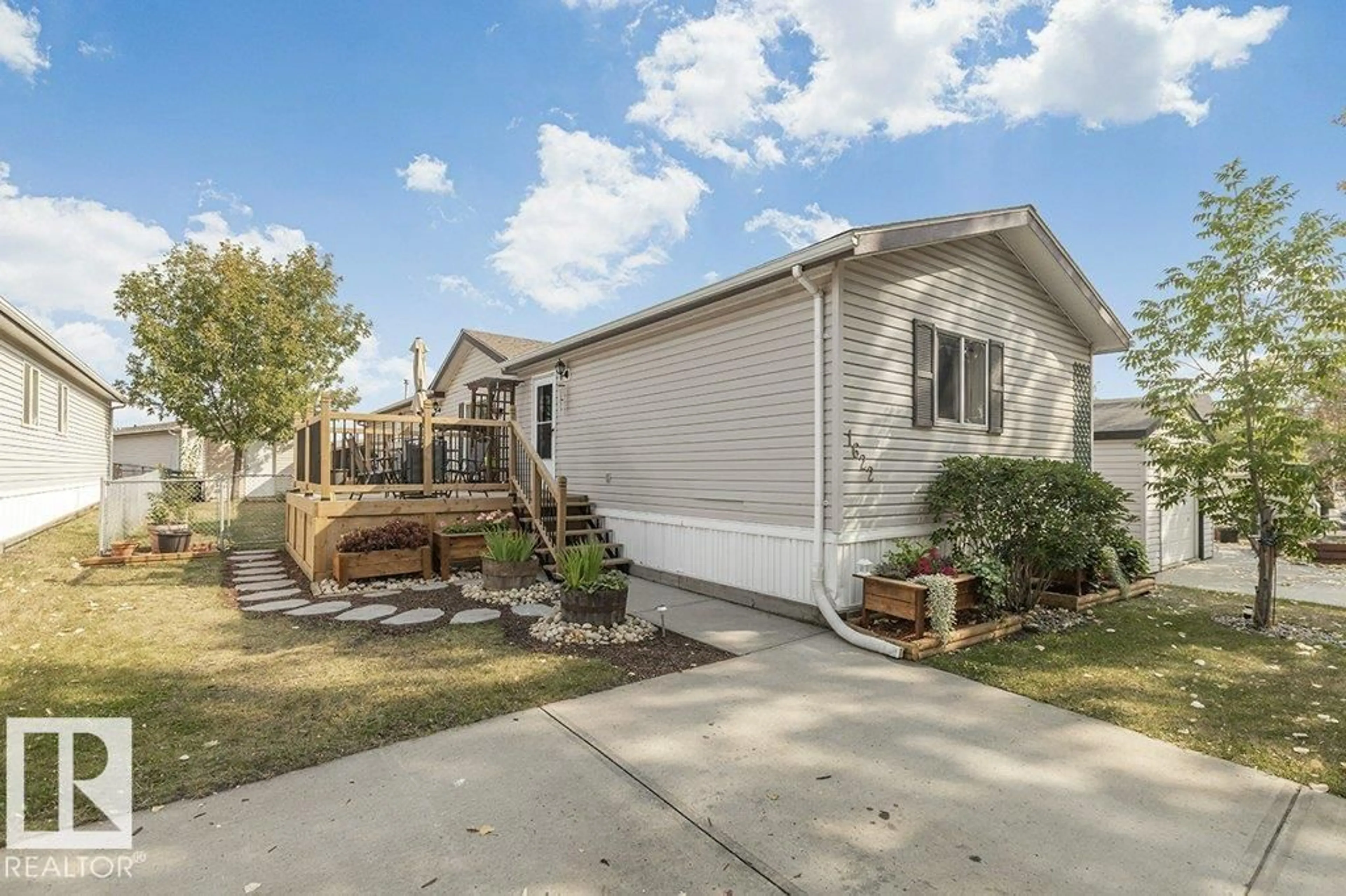 Home with vinyl exterior material, street for NW - 1622 66 AV, Edmonton Alberta T6P0A5