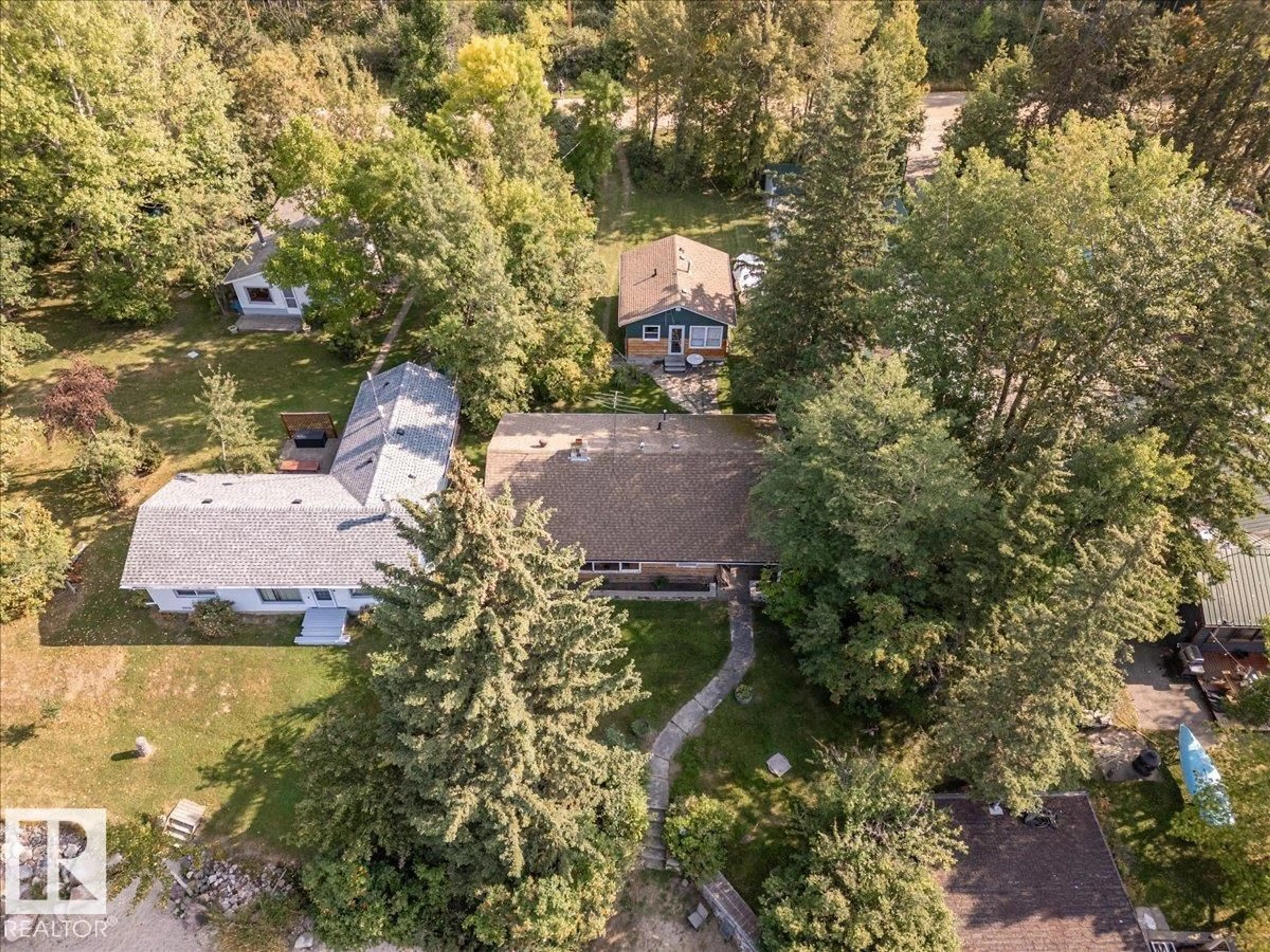A pic from outside/outdoor area/front of a property/back of a property/a pic from drone, unknown for 60 BEACH AVE, Rural Leduc County Alberta T0C2C0