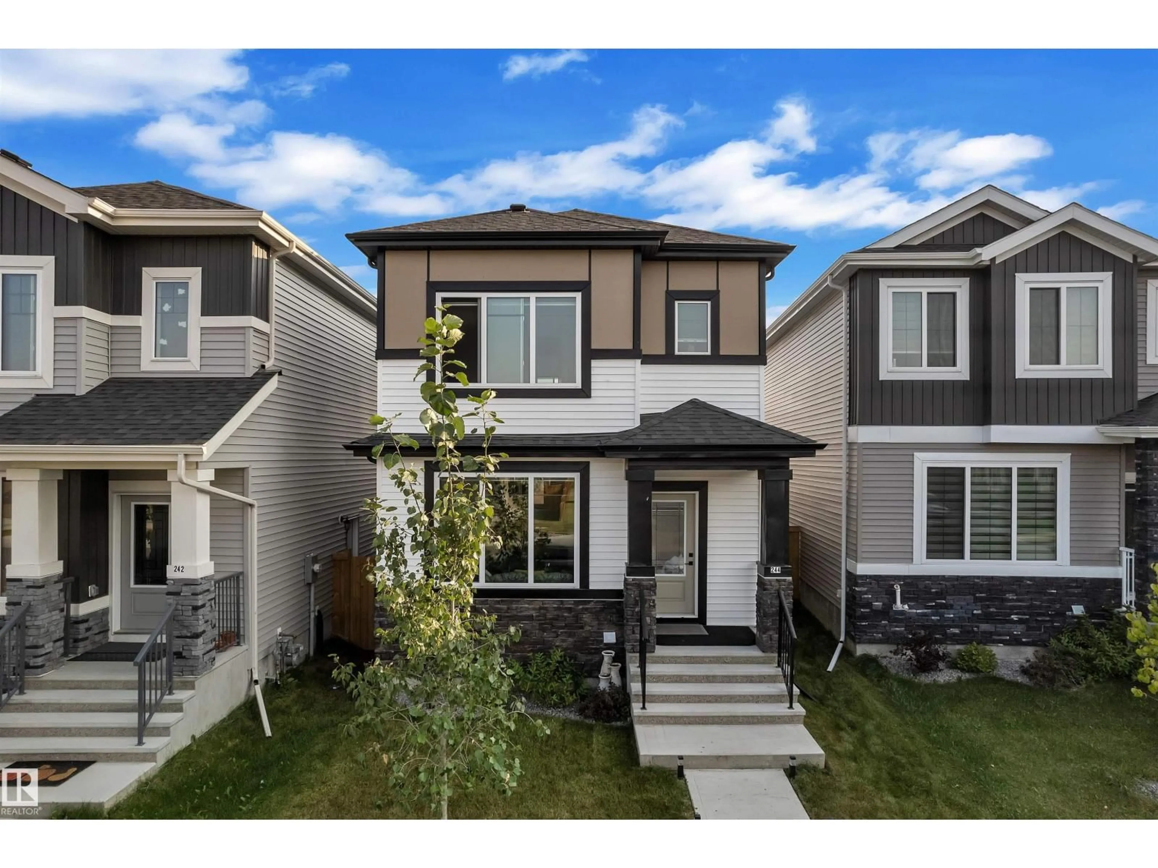Home with vinyl exterior material, street for 244 ROLSTON WD, Leduc Alberta T9E1N1