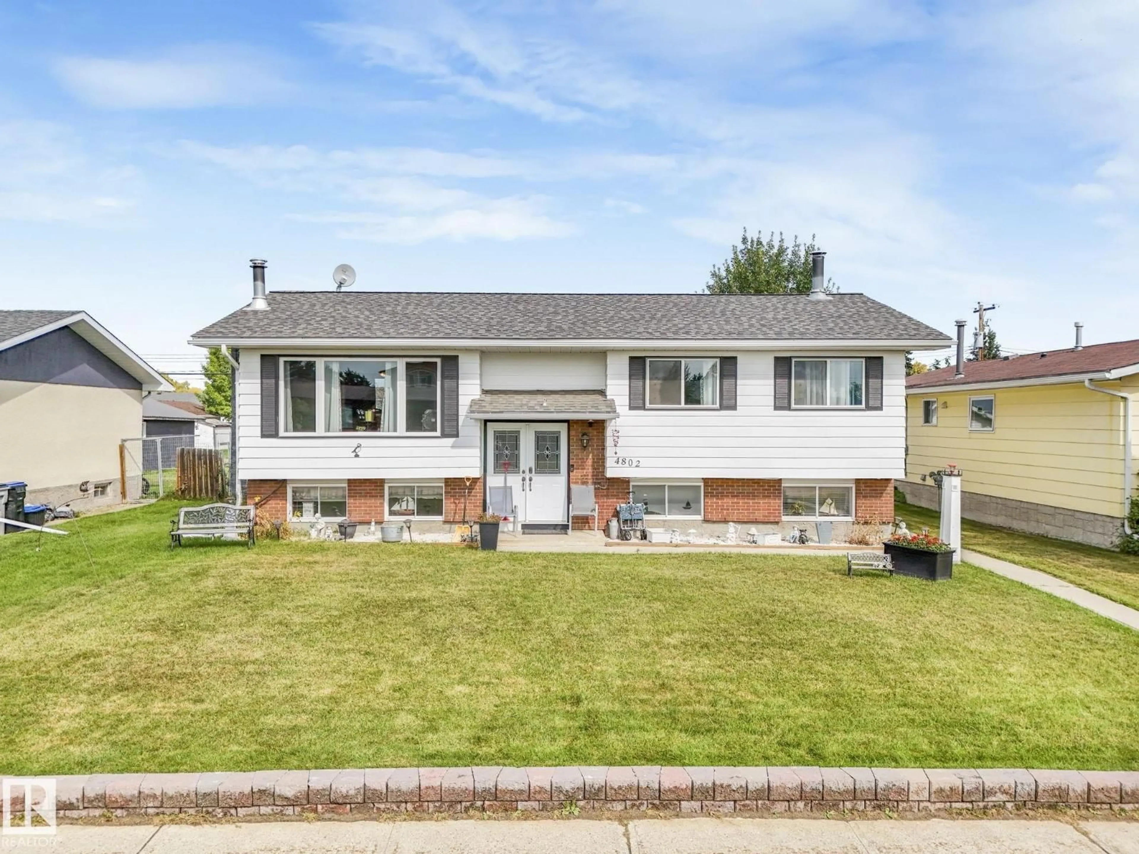 Home with vinyl exterior material, street for 4802 46 AV, Mayerthorpe Alberta T0E1N0