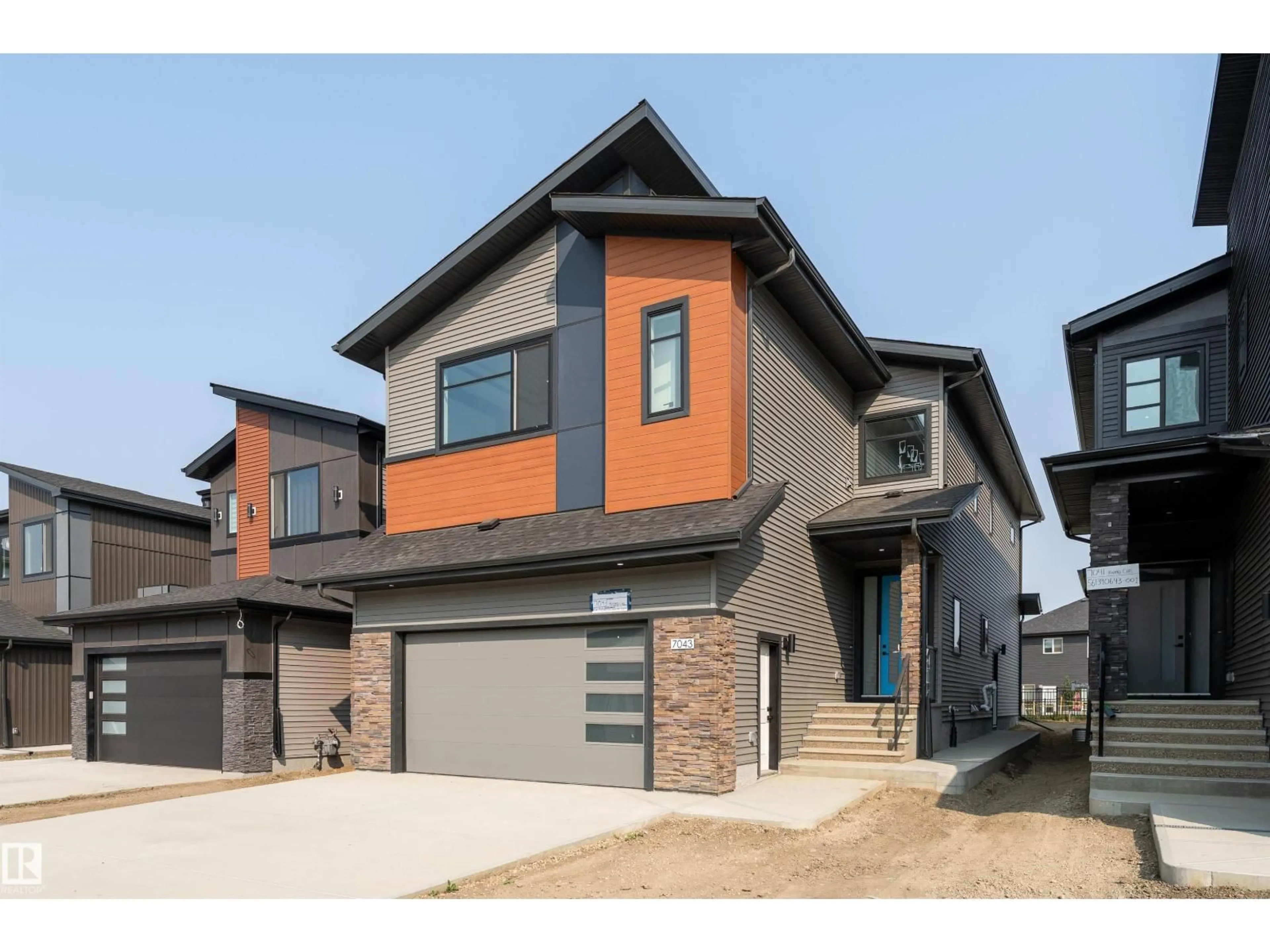 Home with brick exterior material, street for SW - 7043 KIVIAQ CR, Edmonton Alberta T6W5R2