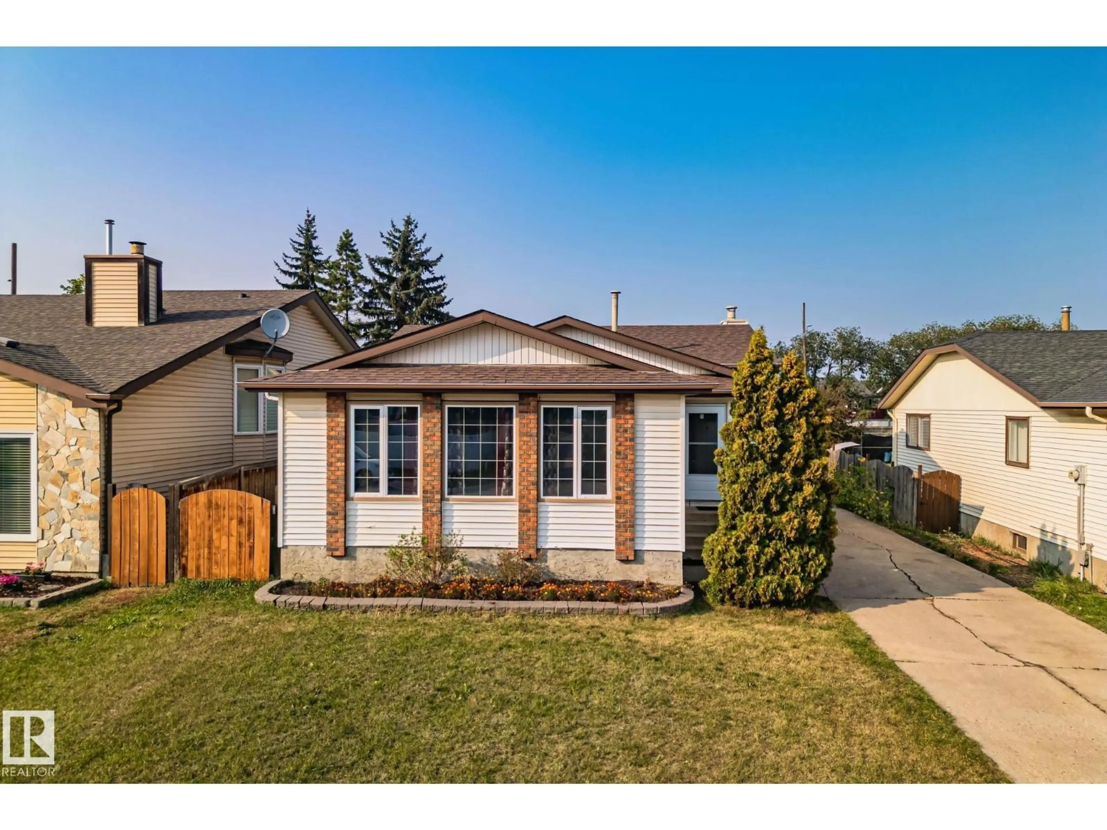 Home with vinyl exterior material, street for 18820 86A AV, Edmonton Alberta T5T4X9