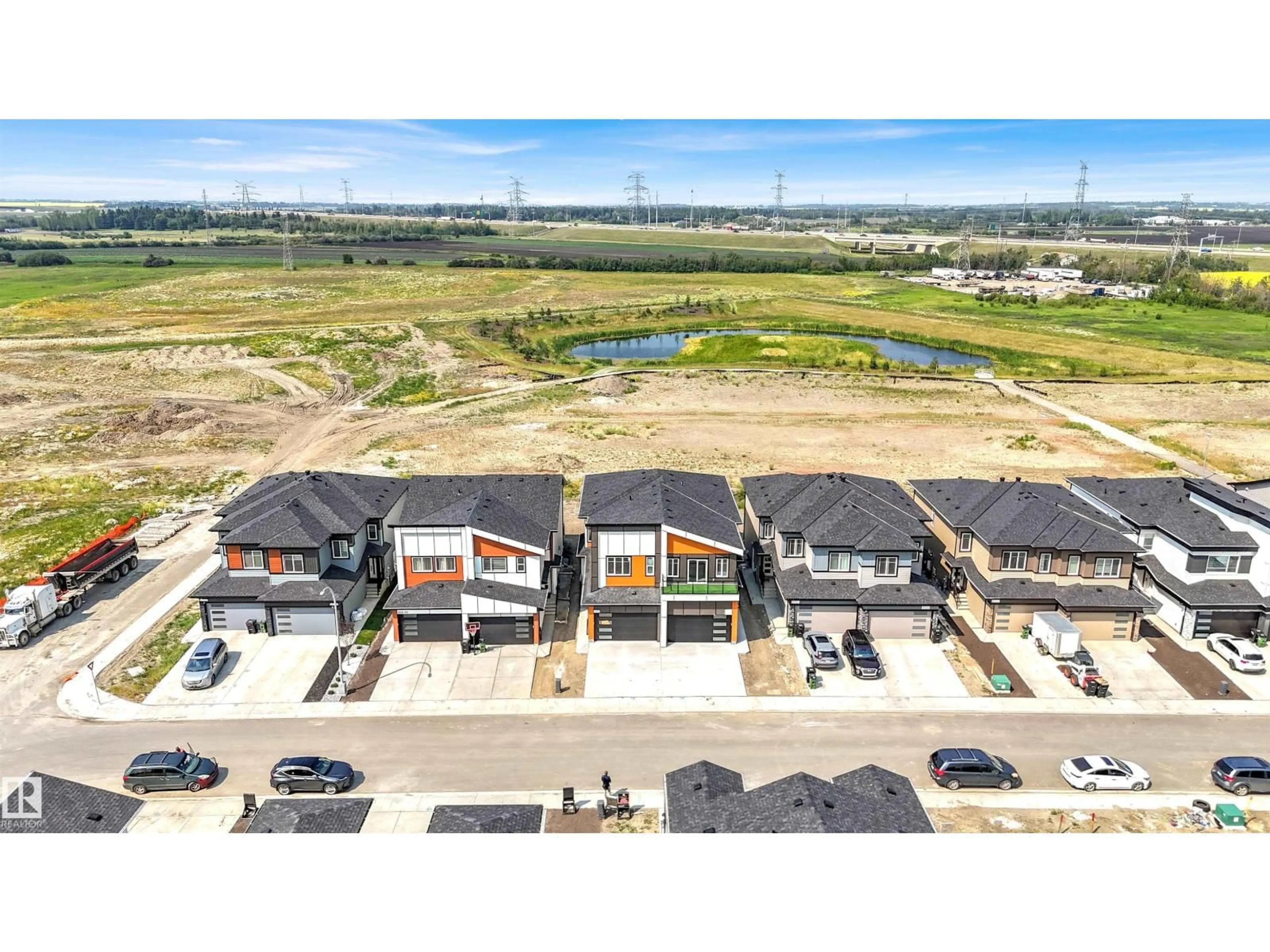 A pic from outside/outdoor area/front of a property/back of a property/a pic from drone, unknown for NW - 2020 155 AV, Edmonton Alberta T5Y4H9