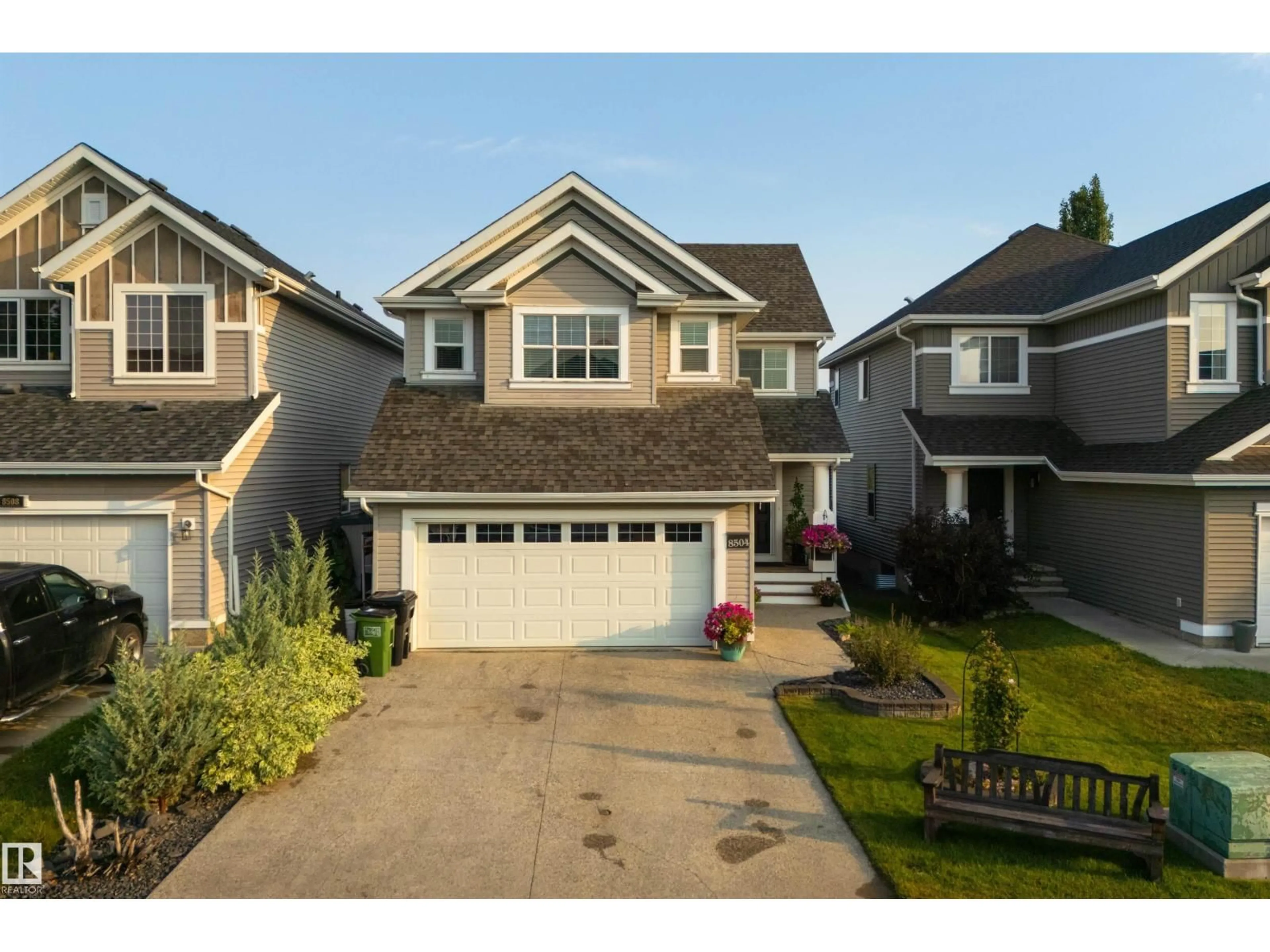 Home with vinyl exterior material, street for 8504 16A AV, Edmonton Alberta T6X0H9