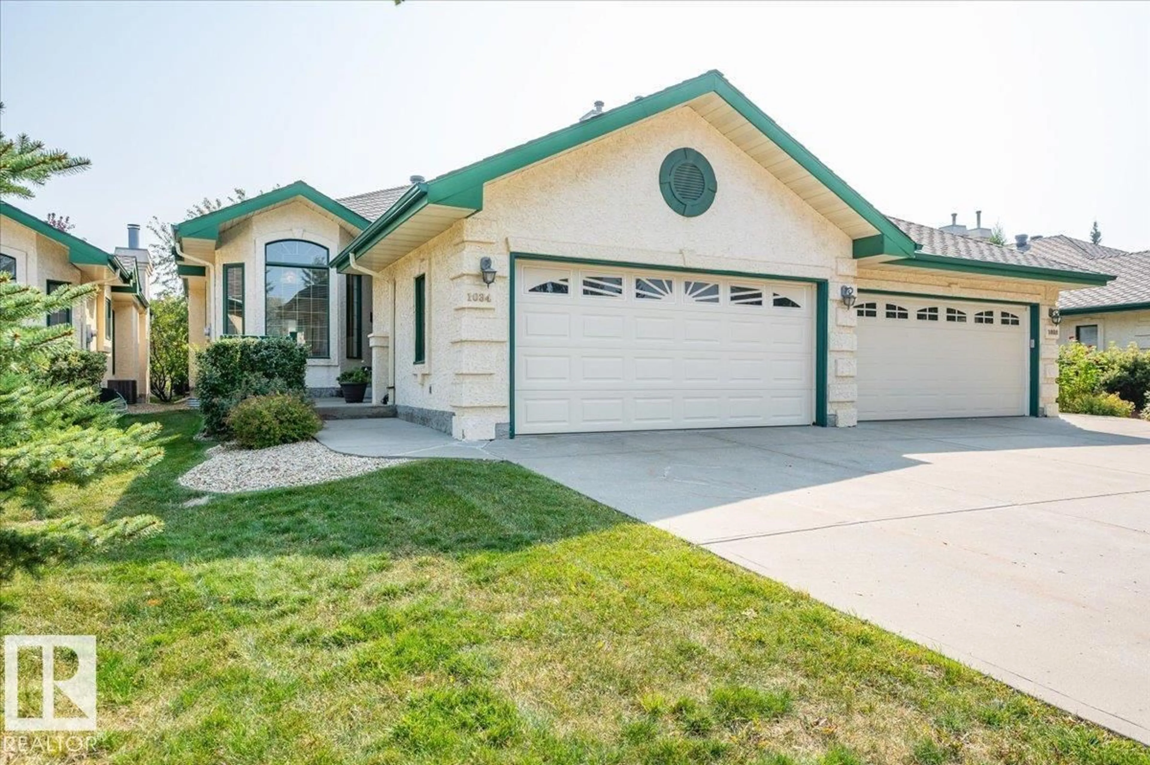 Home with vinyl exterior material, street for 1034 CARTER CREST RD, Edmonton Alberta T6R2K2