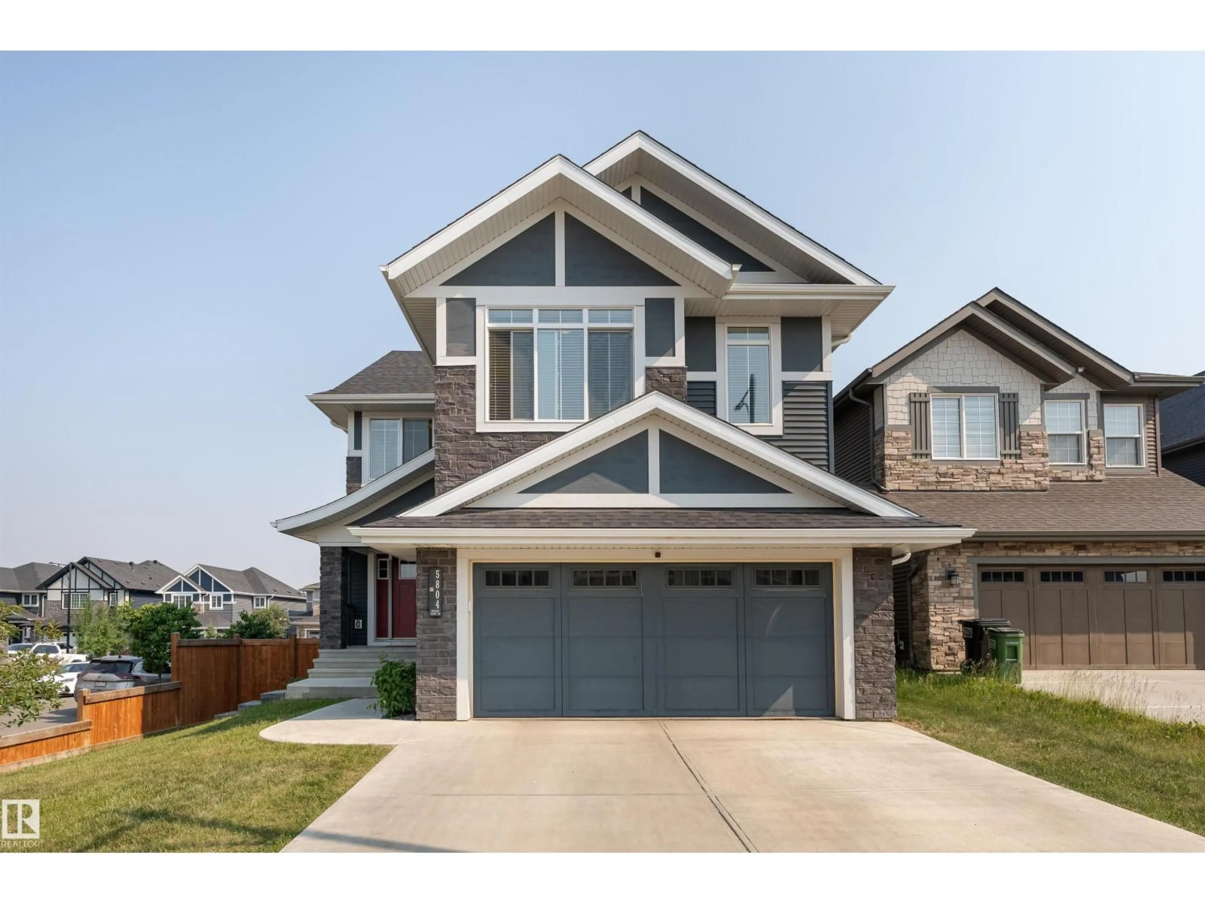 Home with vinyl exterior material, street for 5804 KEEPING CO, Edmonton Alberta T6W4K4