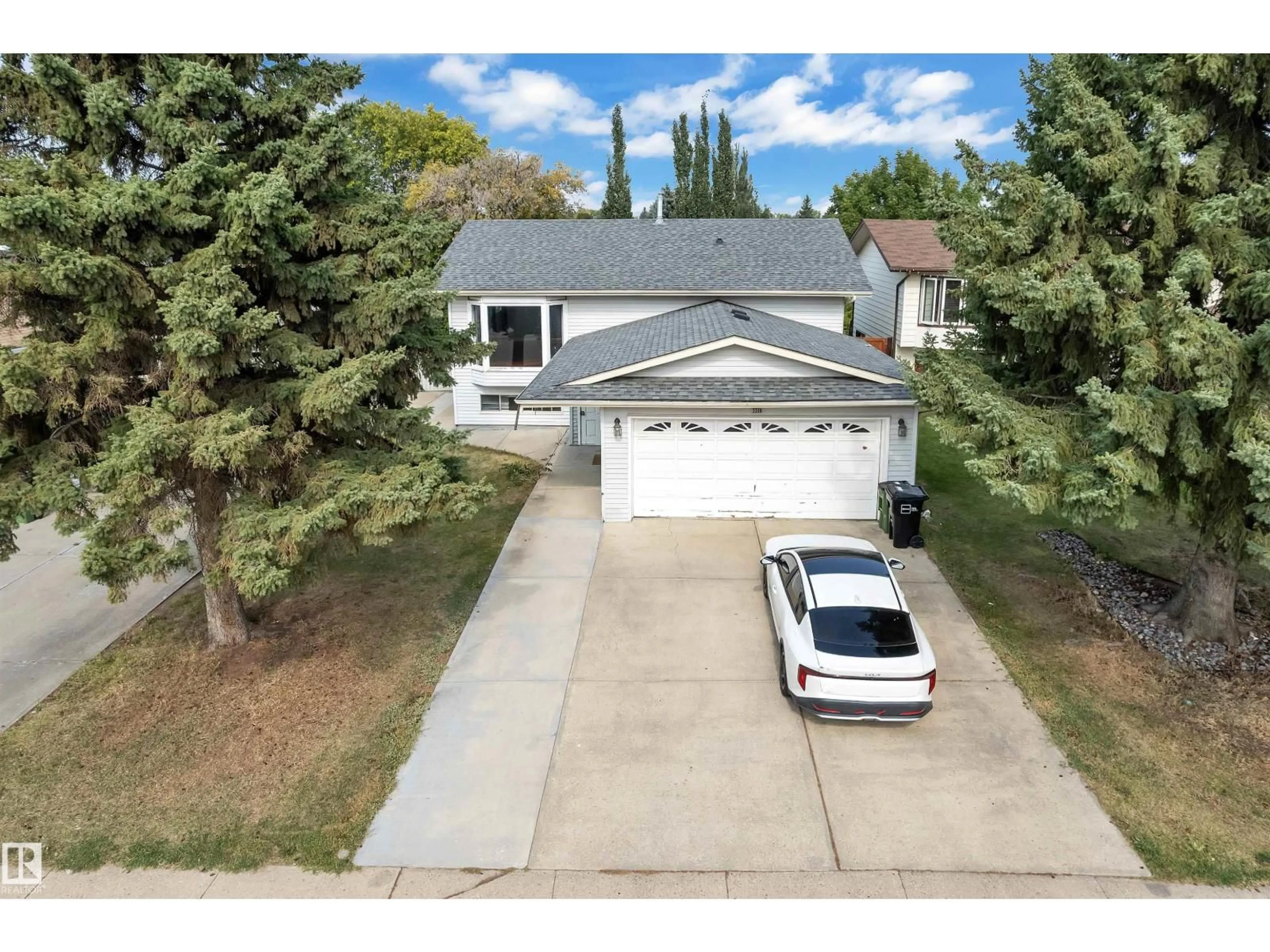 A pic from outside/outdoor area/front of a property/back of a property/a pic from drone, street for 3516 19 AV, Edmonton Alberta T6L2Z9