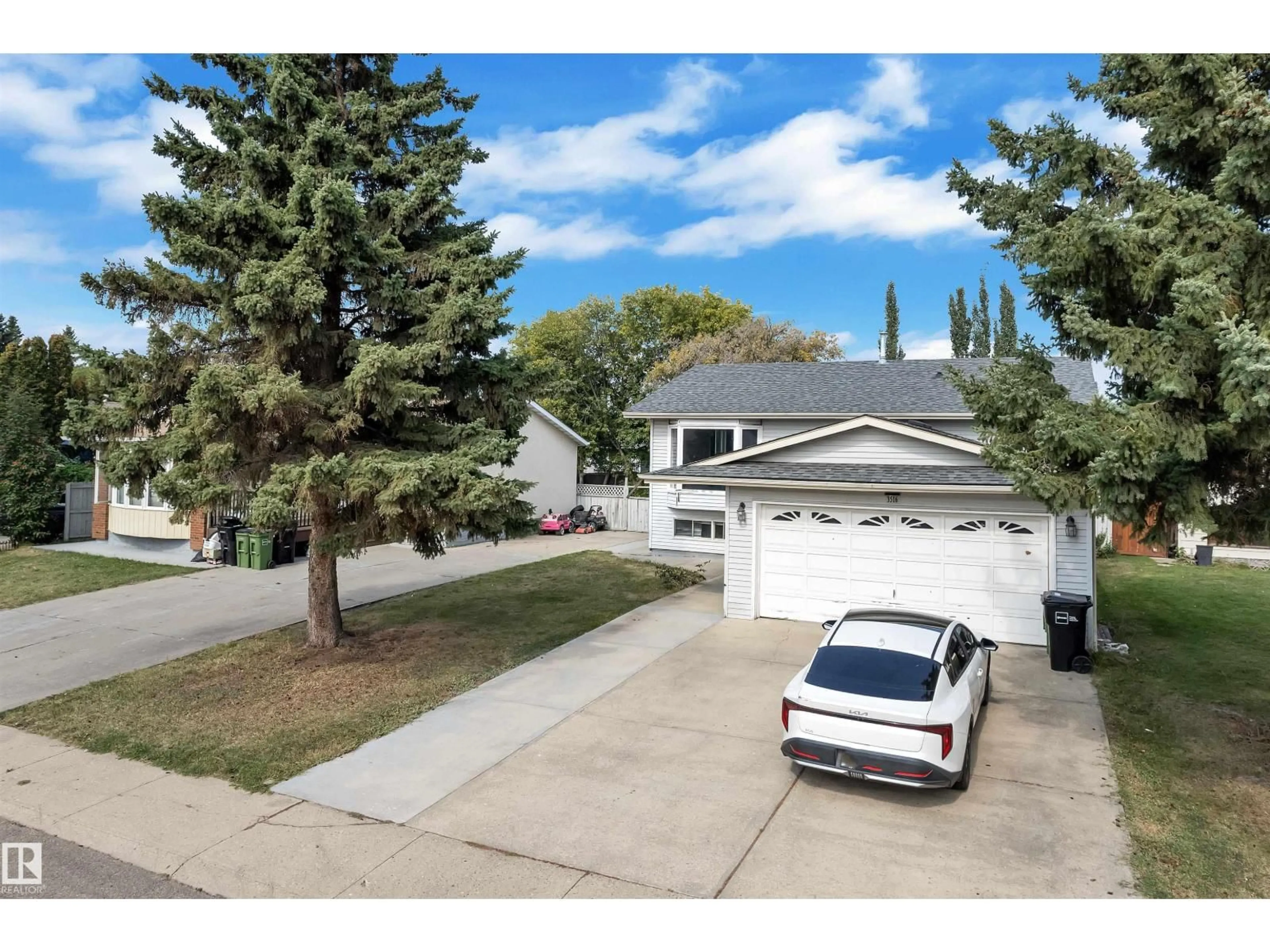 A pic from outside/outdoor area/front of a property/back of a property/a pic from drone, street for 3516 19 AV, Edmonton Alberta T6L2Z9