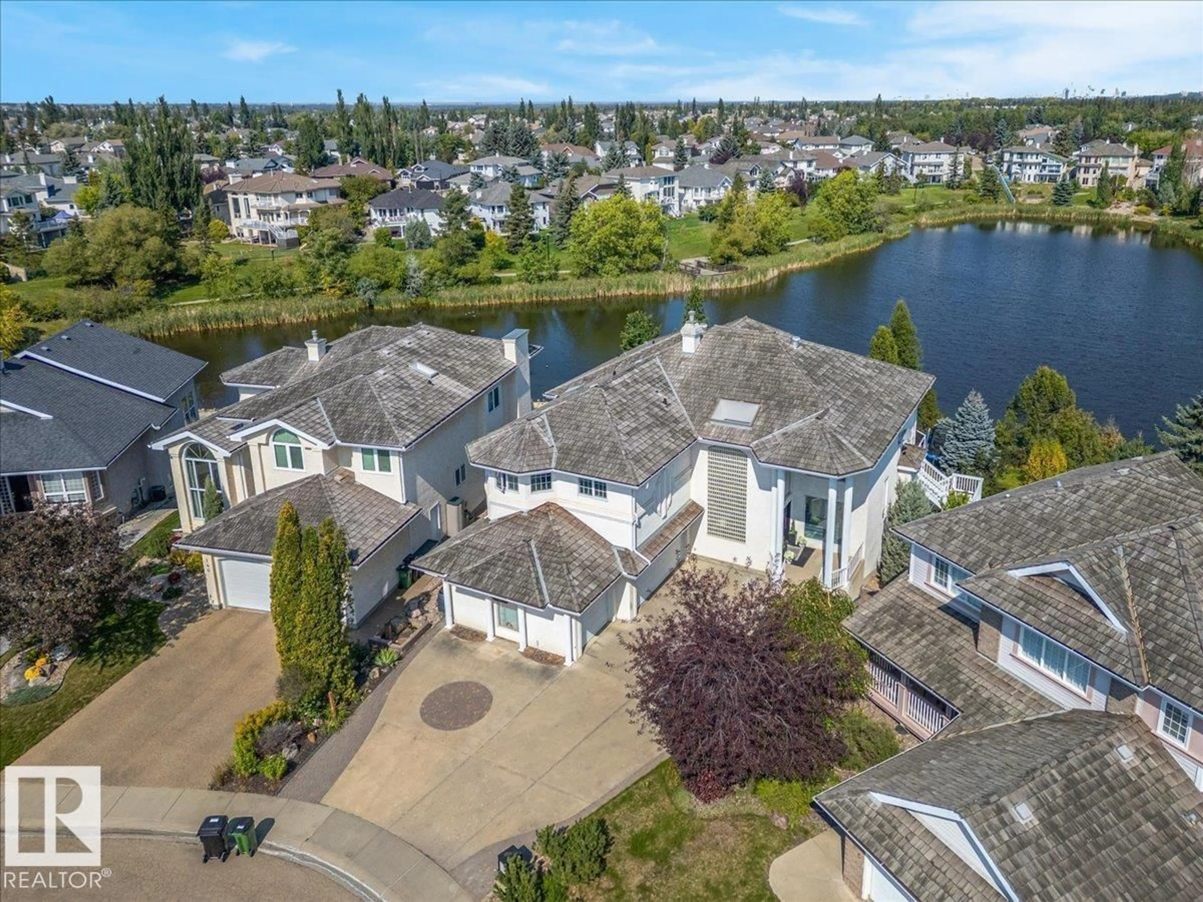A pic from outside/outdoor area/front of a property/back of a property/a pic from drone, water/lake/river/ocean view for 138 TWIN BROOKS COVE CV, Edmonton Alberta T6J6W6