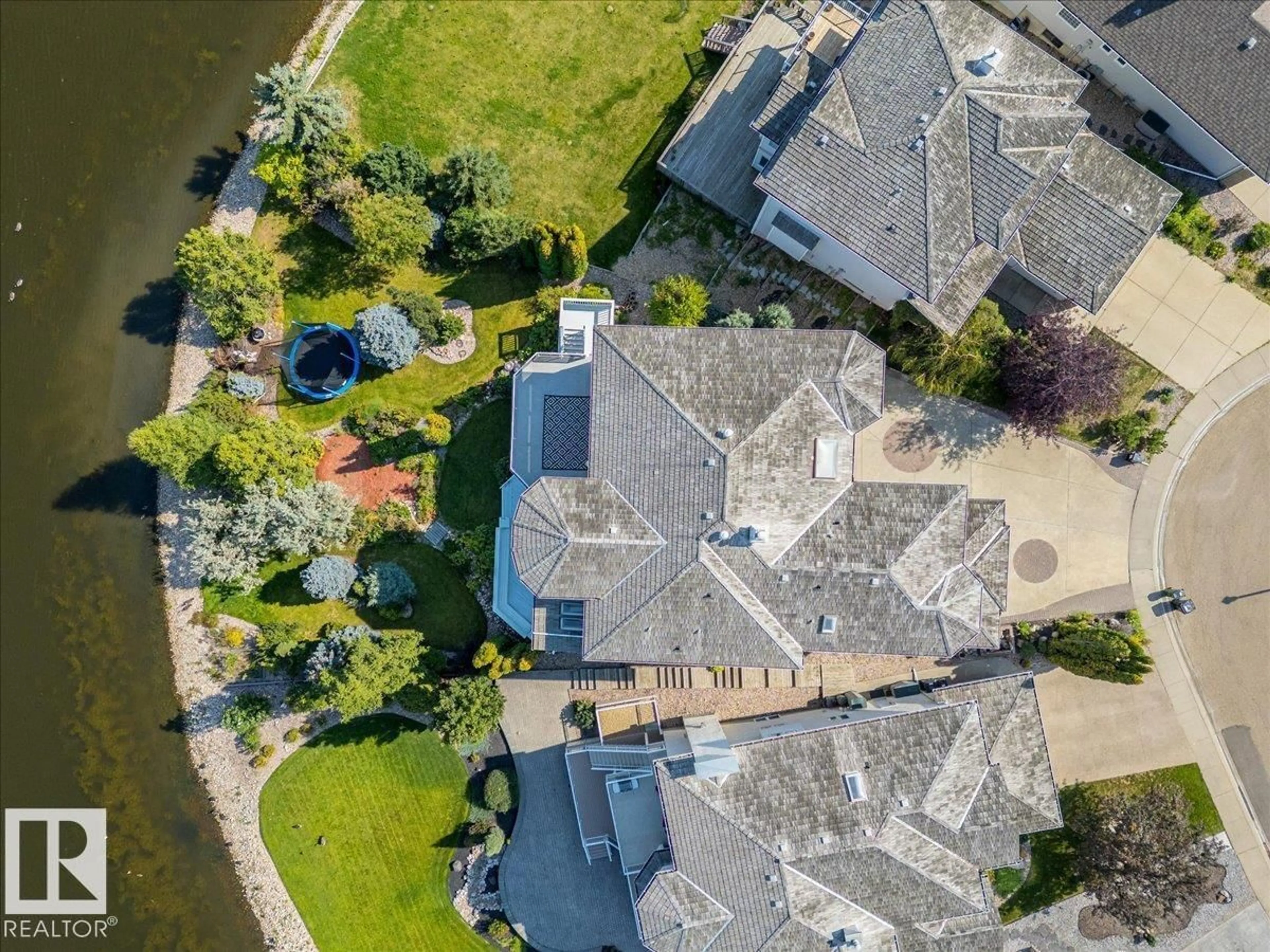 A pic from outside/outdoor area/front of a property/back of a property/a pic from drone, water/lake/river/ocean view for 138 TWIN BROOKS COVE CV, Edmonton Alberta T6J6W6