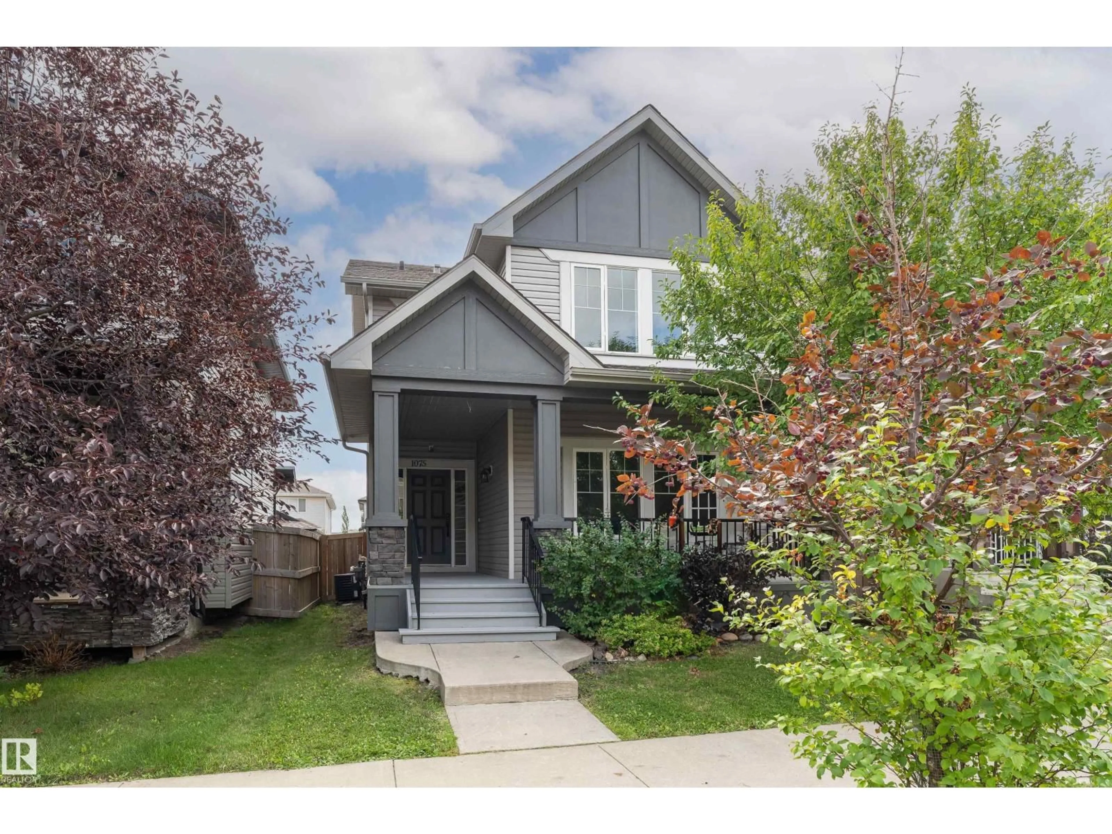 Home with vinyl exterior material, street for 1075 MCCONACHIE BV, Edmonton Alberta T5Y0P7