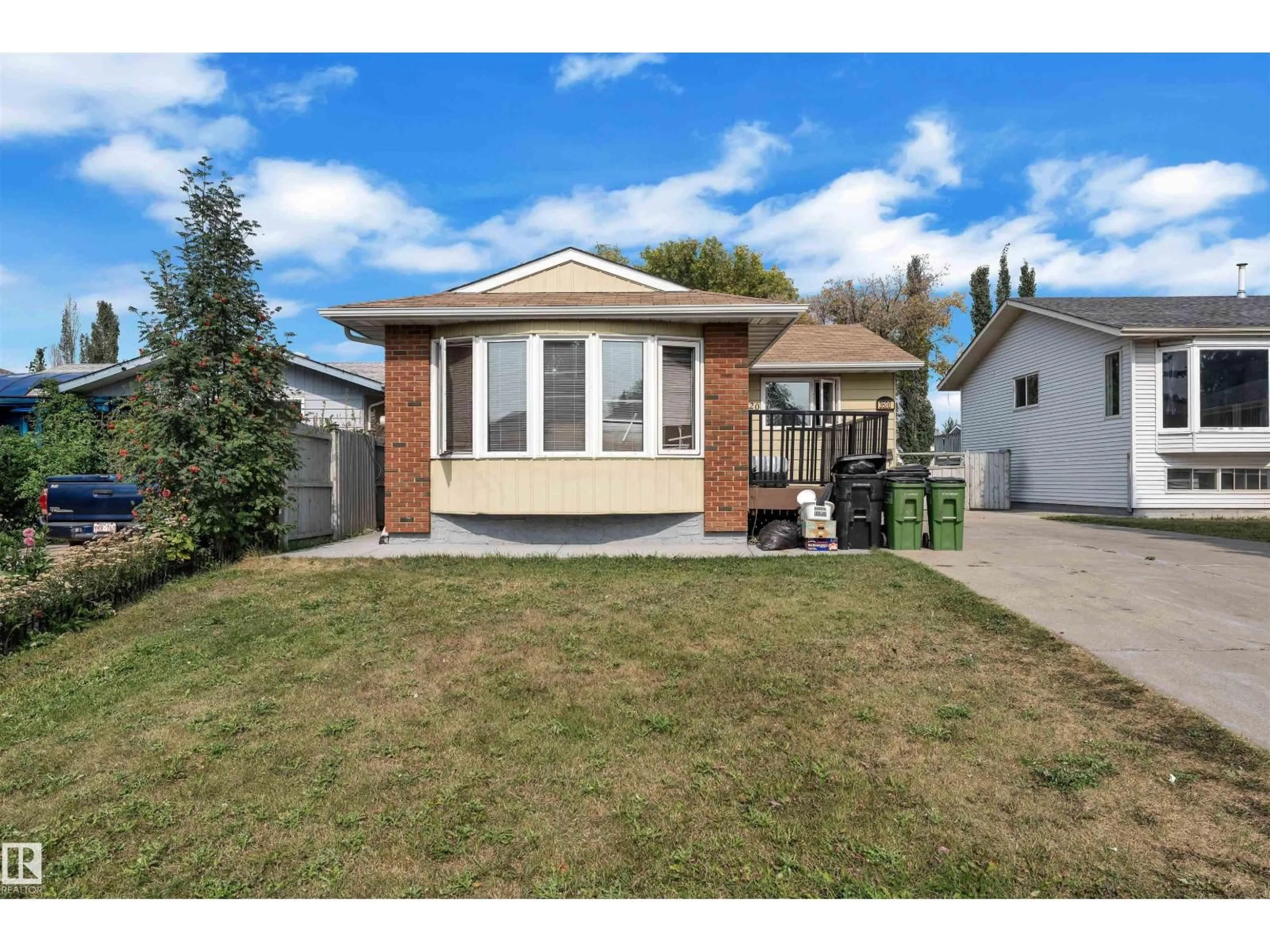 Home with vinyl exterior material, street for 3520 19 AV, Edmonton Alberta T6L2Z9