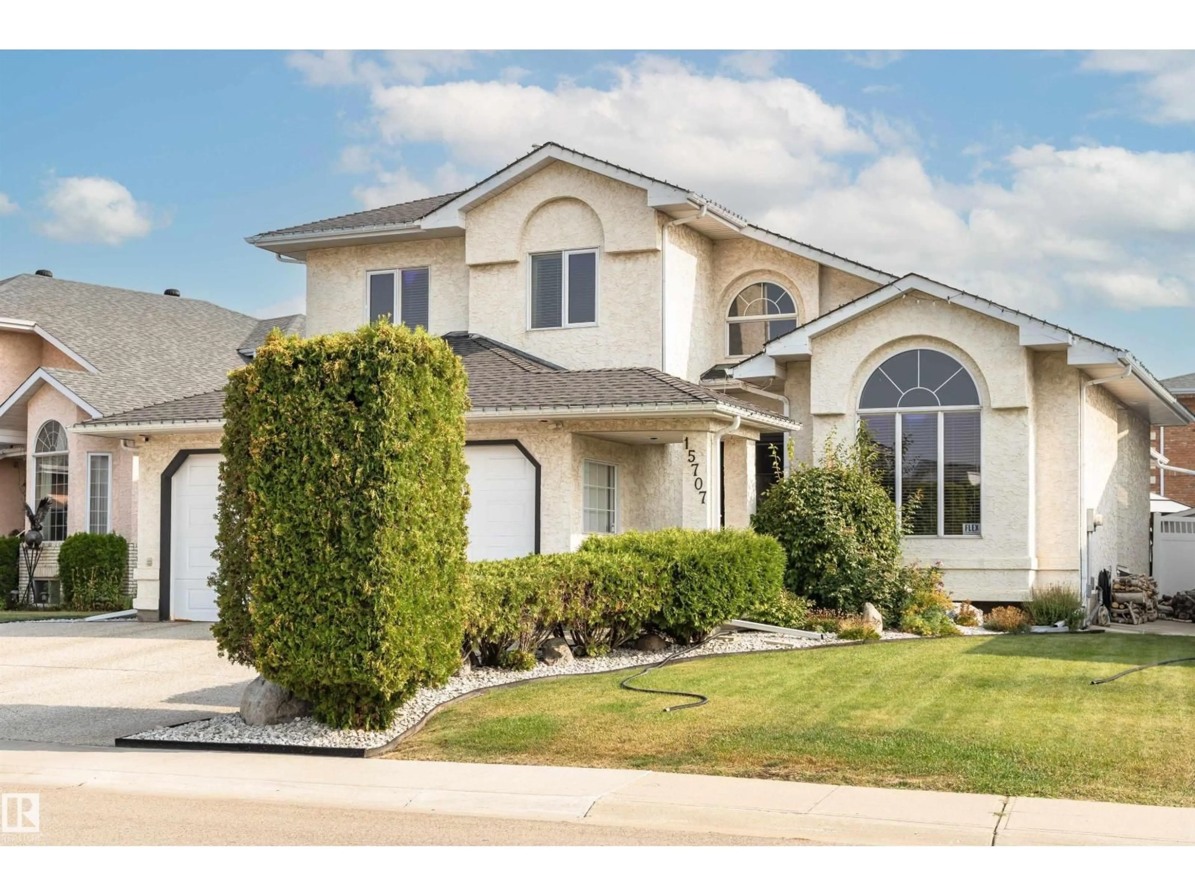 Home with vinyl exterior material, street for 15707 72 ST, Edmonton Alberta T5Z2Z3