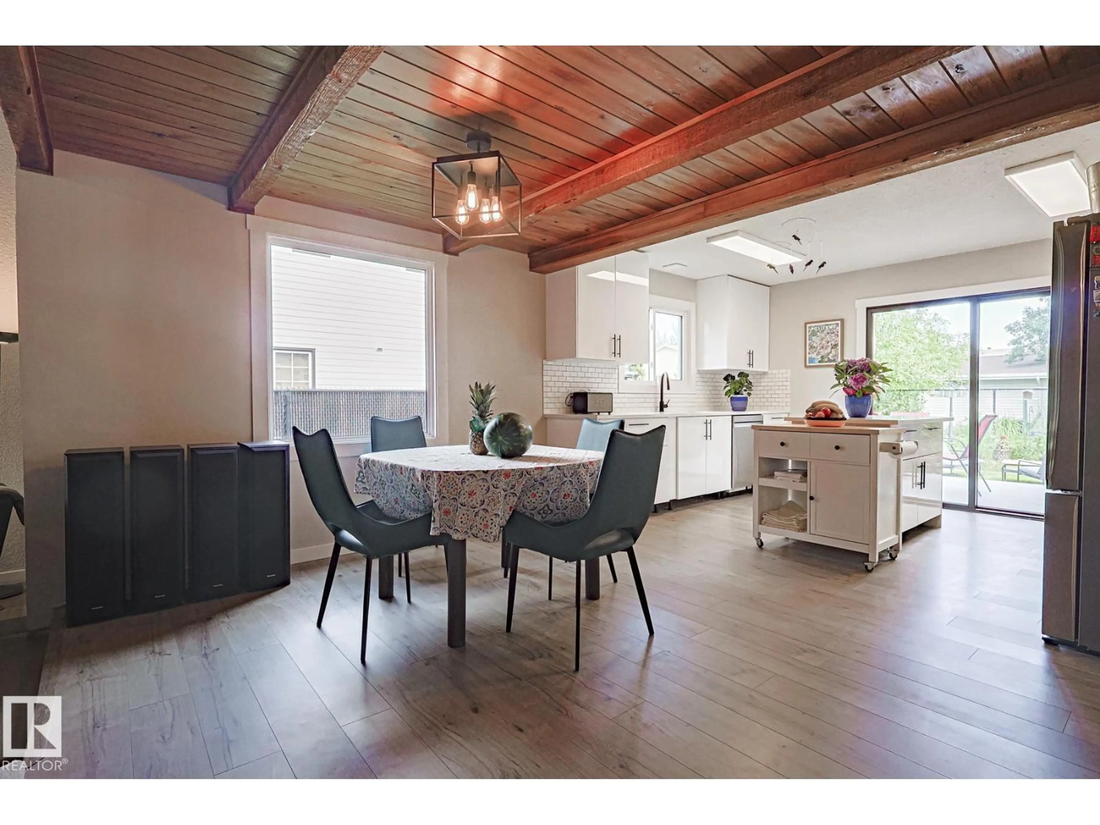 Dining room, wood/laminate floor for 10614 25A AV, Edmonton Alberta T6J4K3