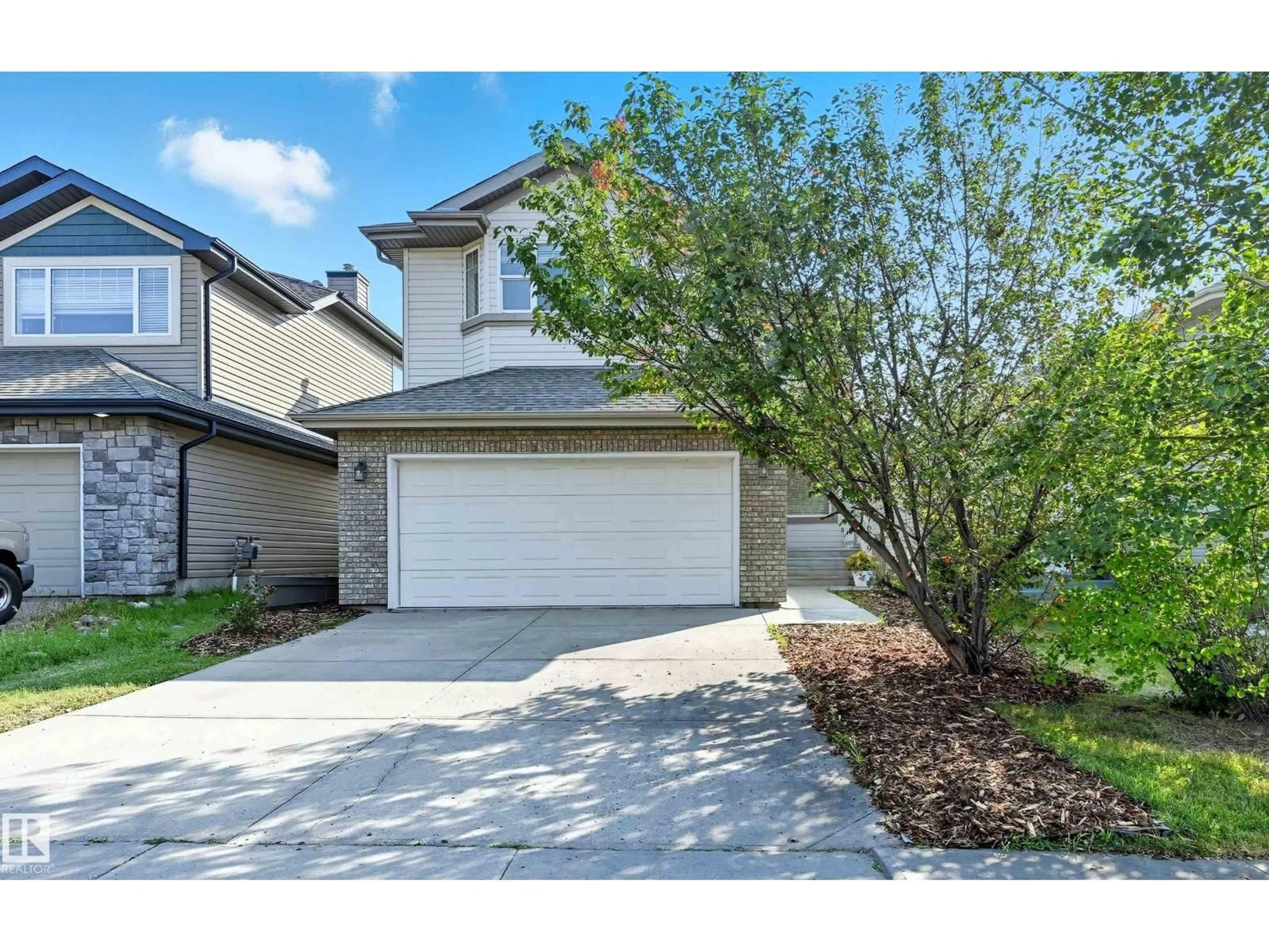 A pic from outside/outdoor area/front of a property/back of a property/a pic from drone, street for 6919 STROM LN, Edmonton Alberta T6R0G3
