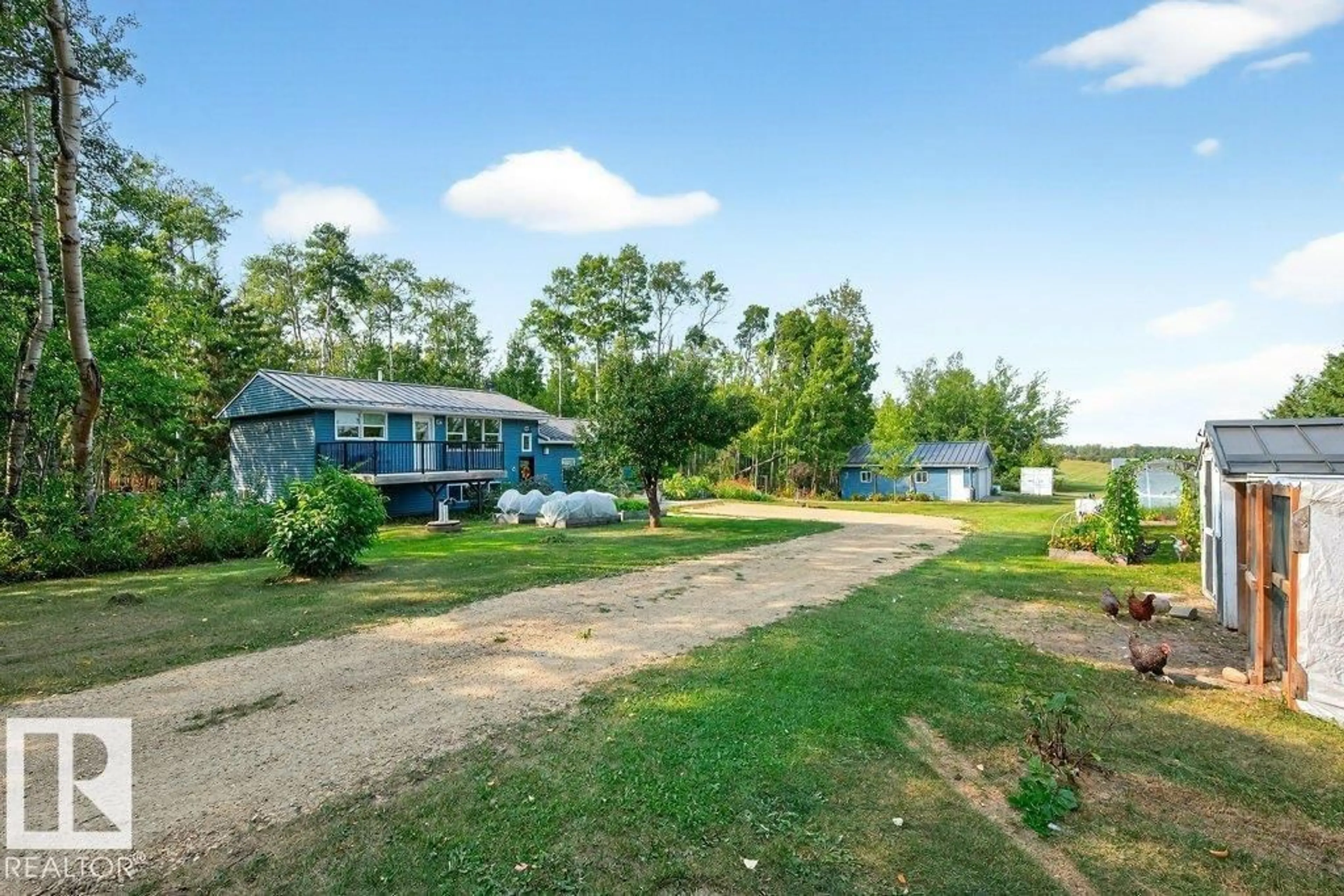 A pic from outside/outdoor area/front of a property/back of a property/a pic from drone, unknown for 12-50105 RANGE ROAD 201, Rural Beaver County Alberta T0B4J2