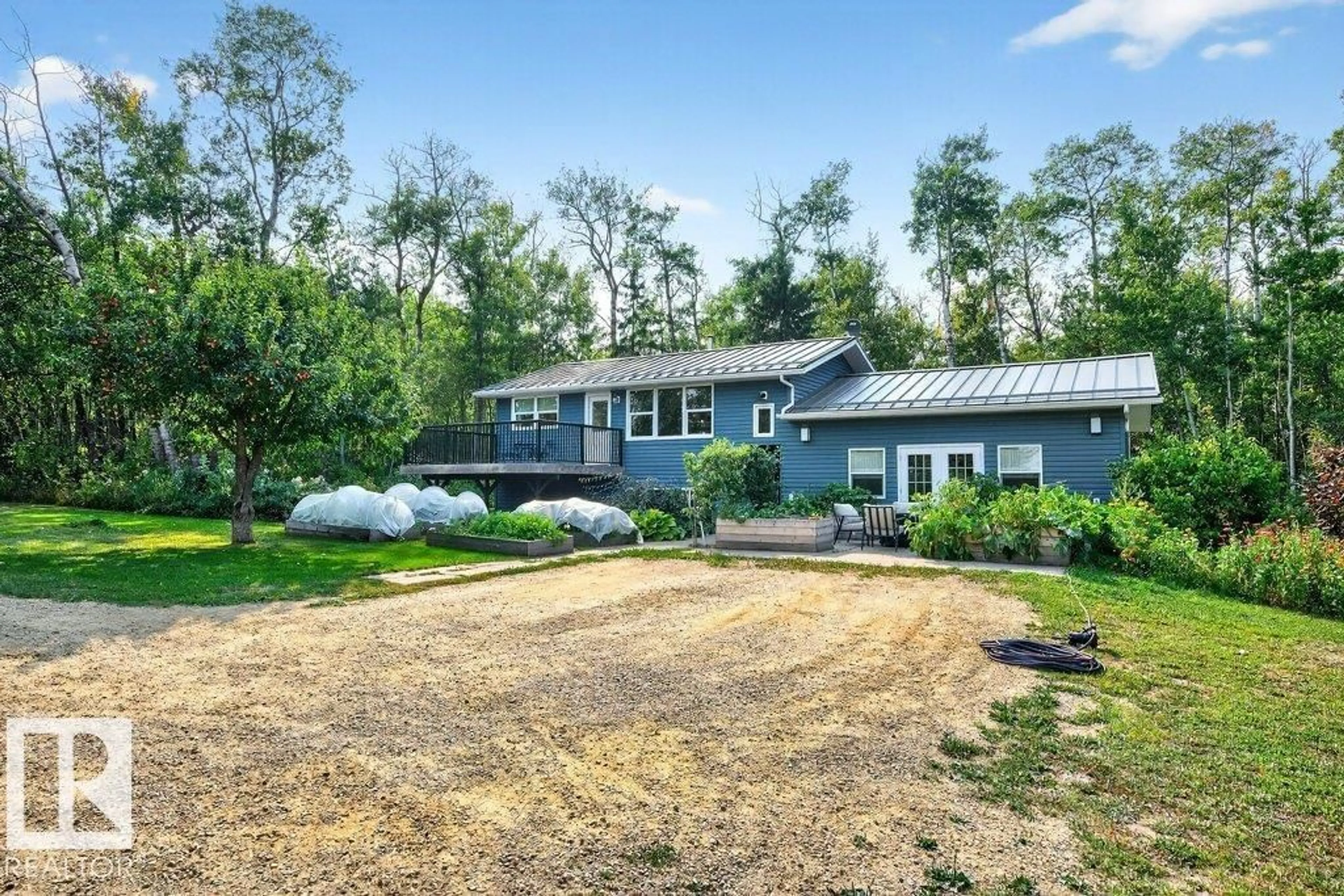 A pic from outside/outdoor area/front of a property/back of a property/a pic from drone, unknown for 12-50105 RANGE ROAD 201, Rural Beaver County Alberta T0B4J2