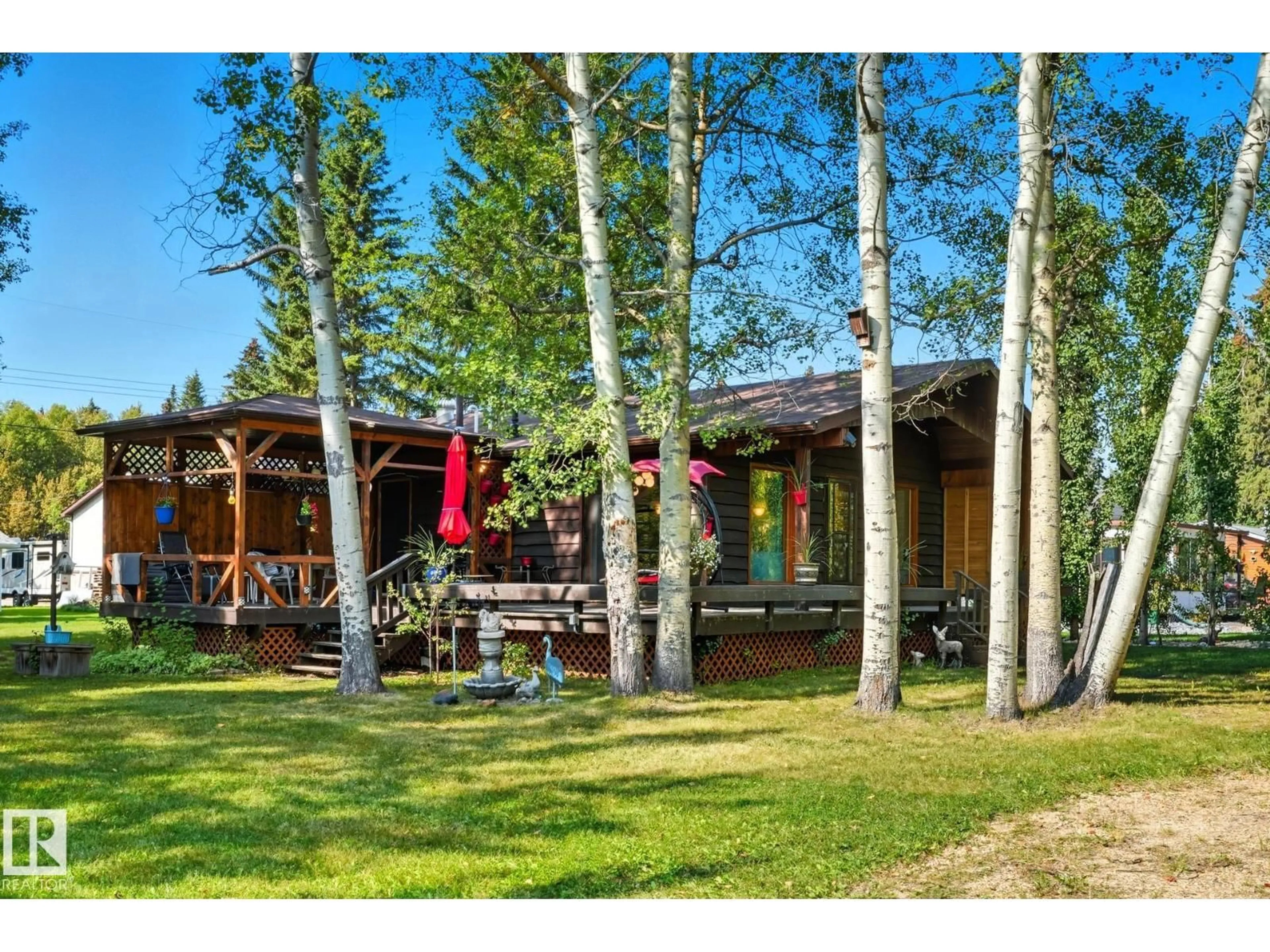 Patio, forest/trees view for 6309 49 ST, Rural Wetaskiwin County Alberta T0C2C0