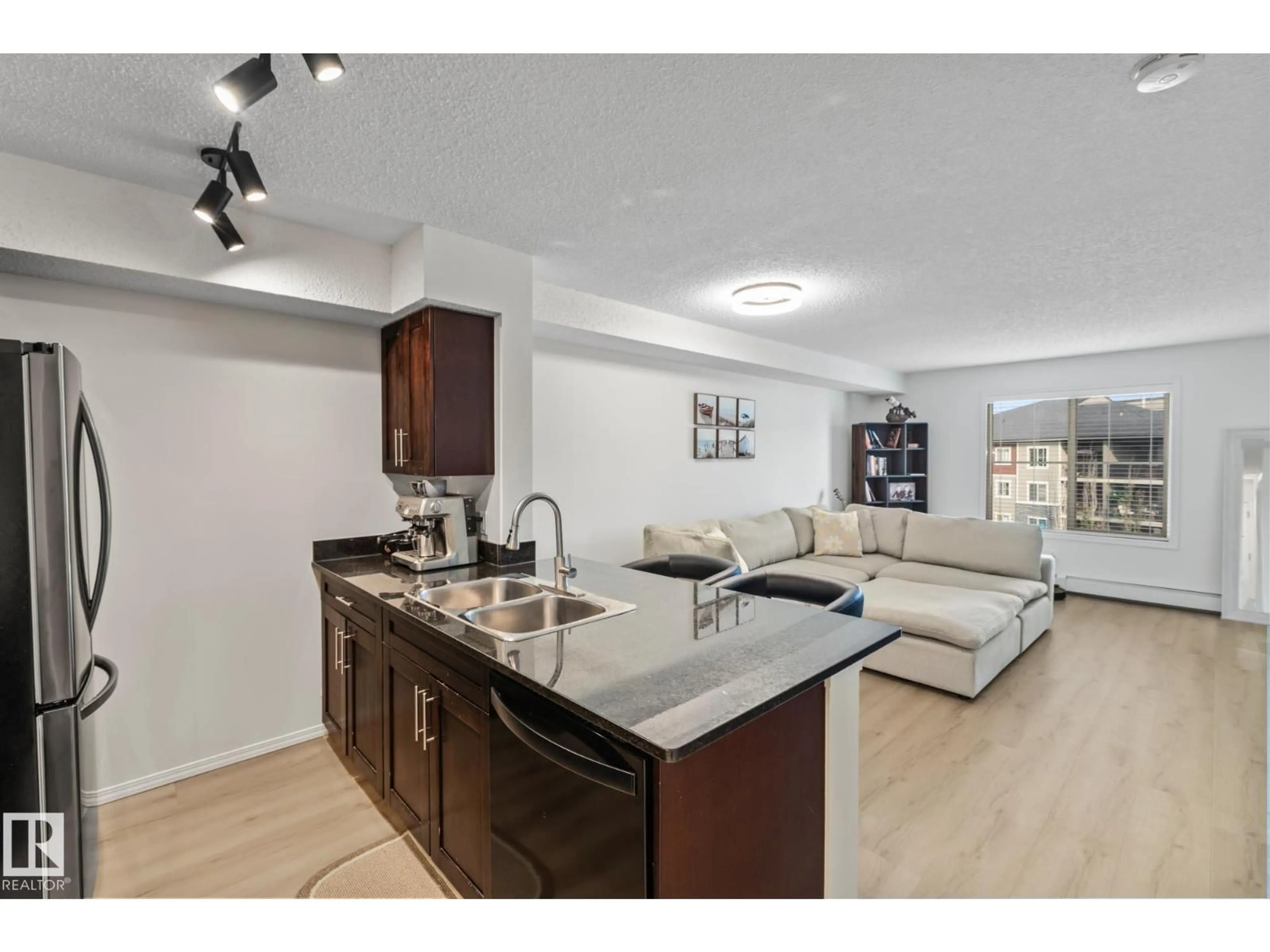Open concept kitchen, unknown for #409 - 1080 MCCONACHIE BLVD, Edmonton Alberta T5Y0X2
