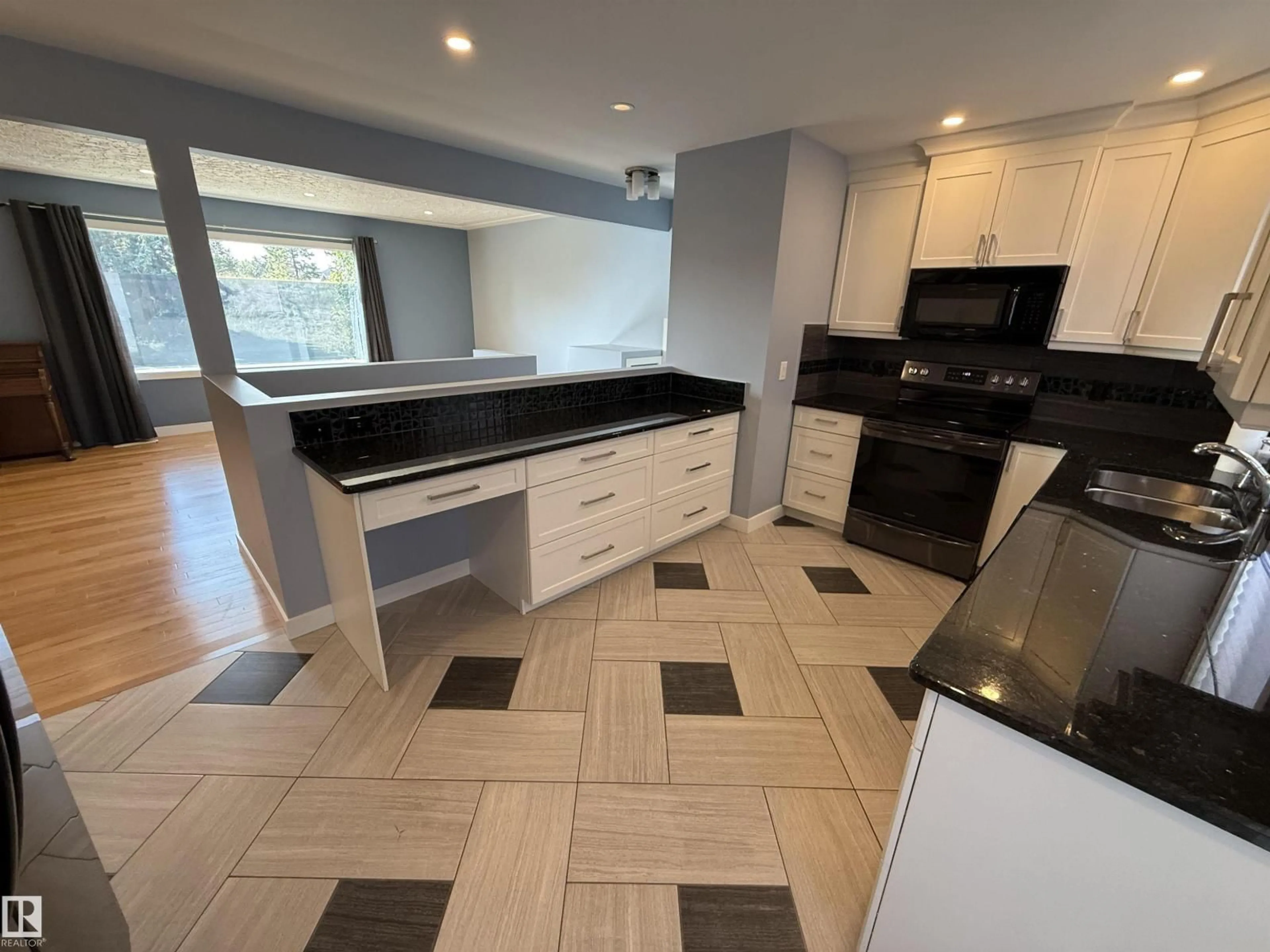 Open concept kitchen, ceramic/tile floor for 13812 132 AV, Edmonton Alberta T5L3R8
