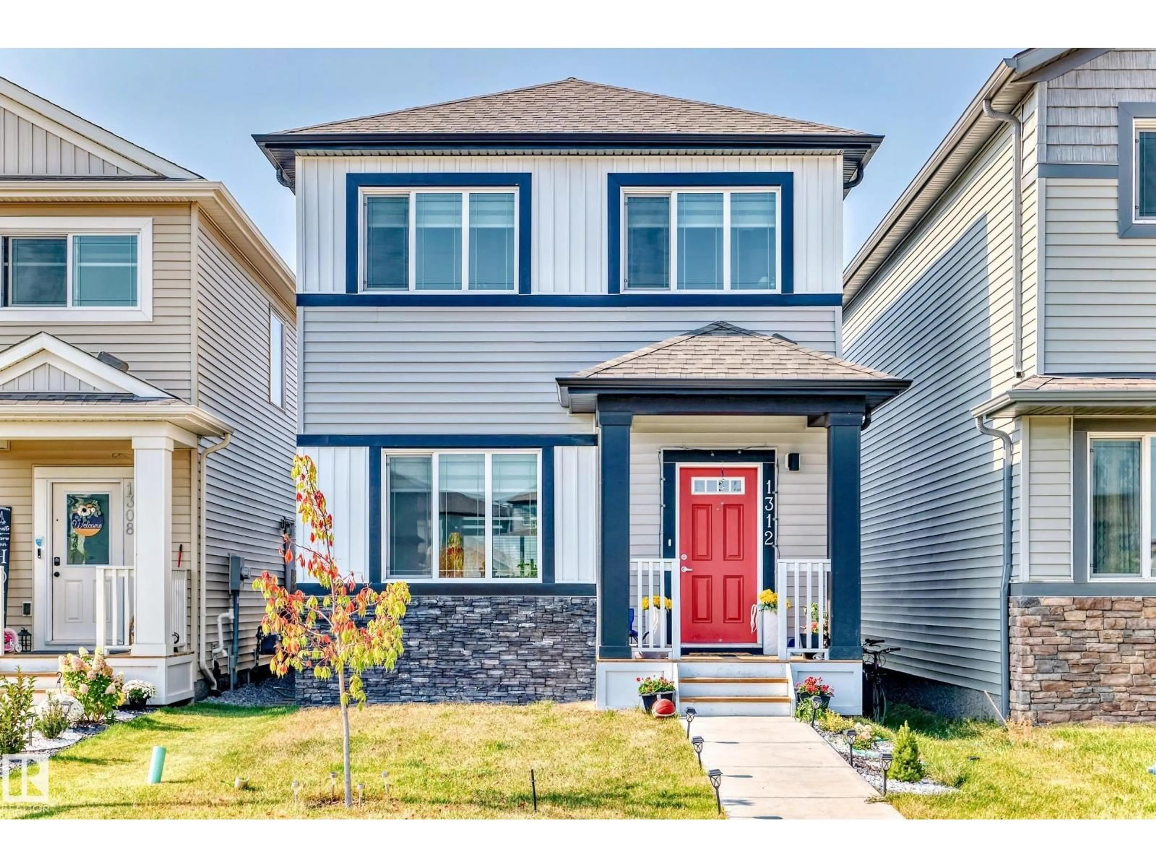 Home with vinyl exterior material, street for 1312 22 ST, Edmonton Alberta T6T2R6