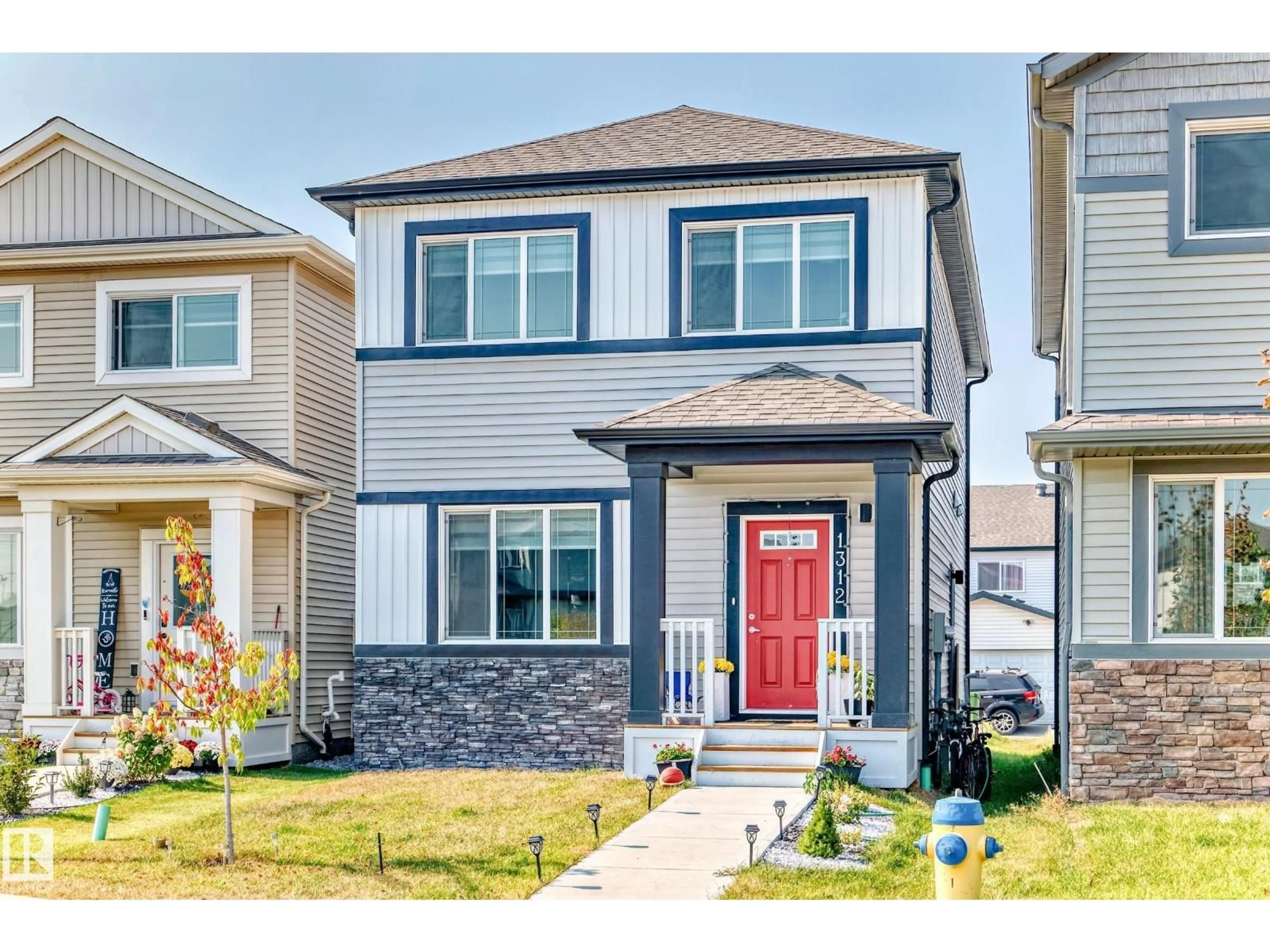 Home with vinyl exterior material, street for 1312 22 ST, Edmonton Alberta T6T2R6