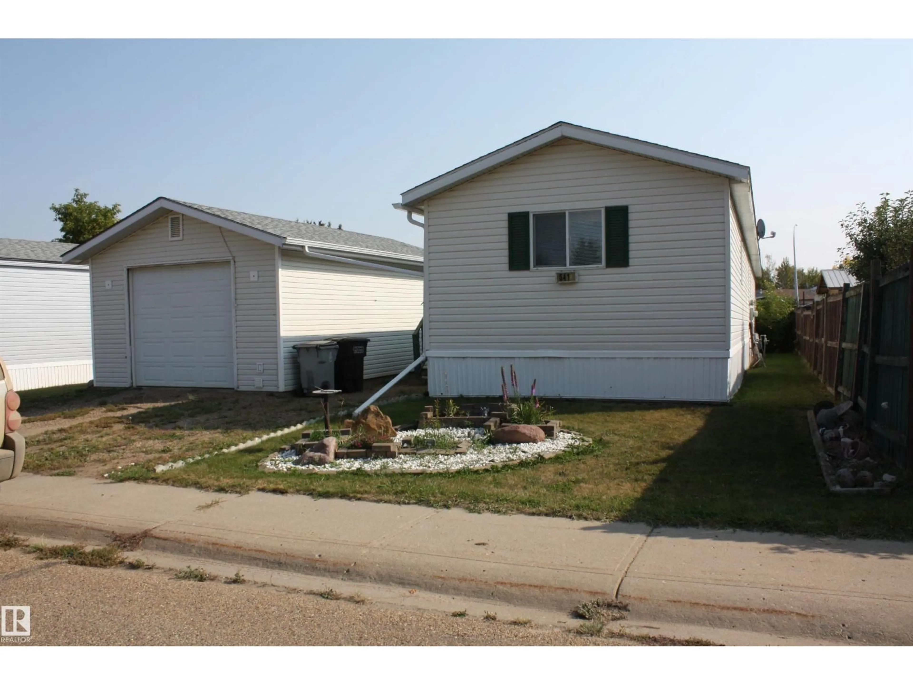 Home with vinyl exterior material, street for 5414 EASTVIEW CRESCENT, Redwater Alberta T0A2W0