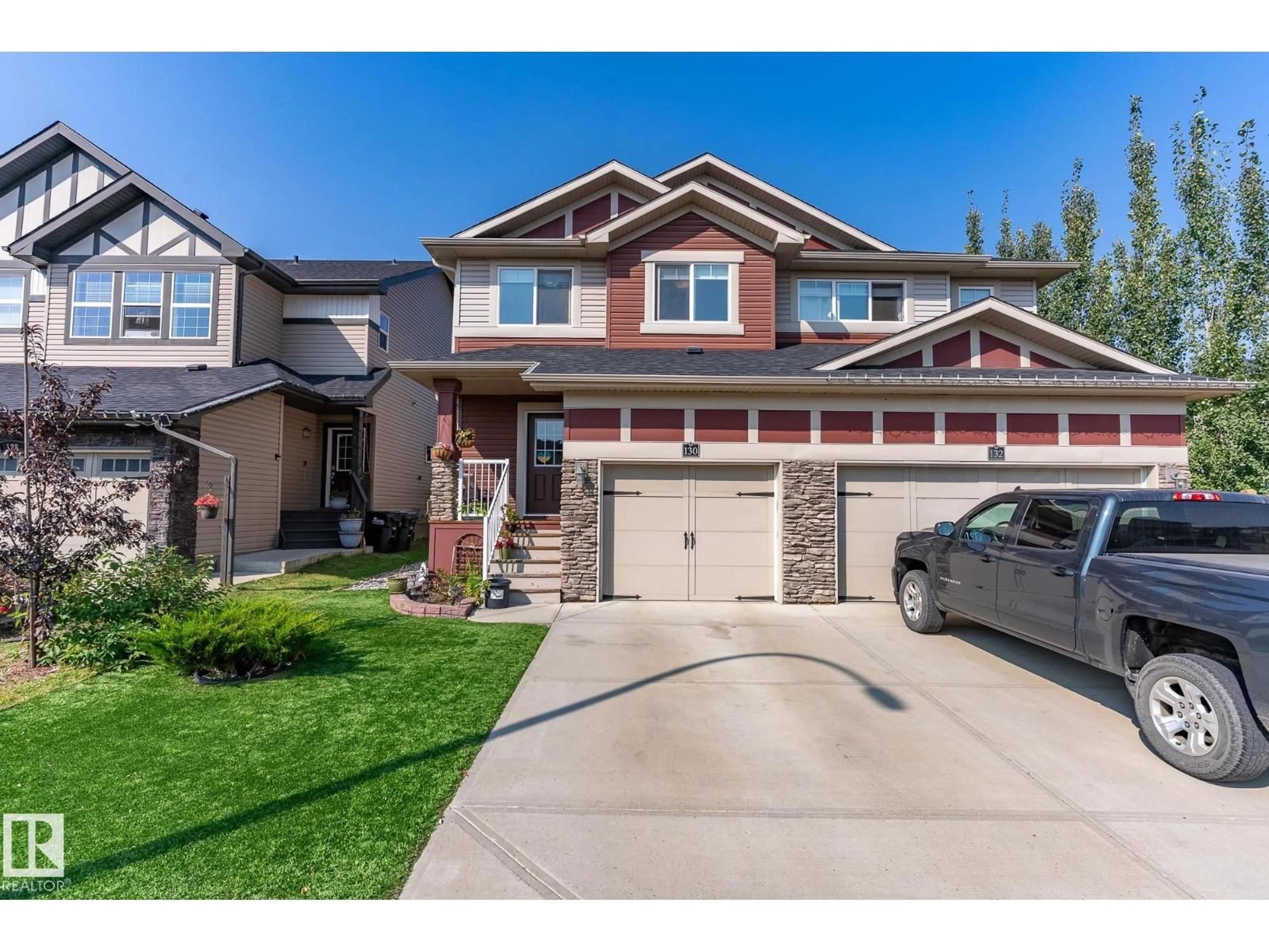 Home with vinyl exterior material, street for 130 ABBEY RD, Sherwood Park Alberta T8H0Z2