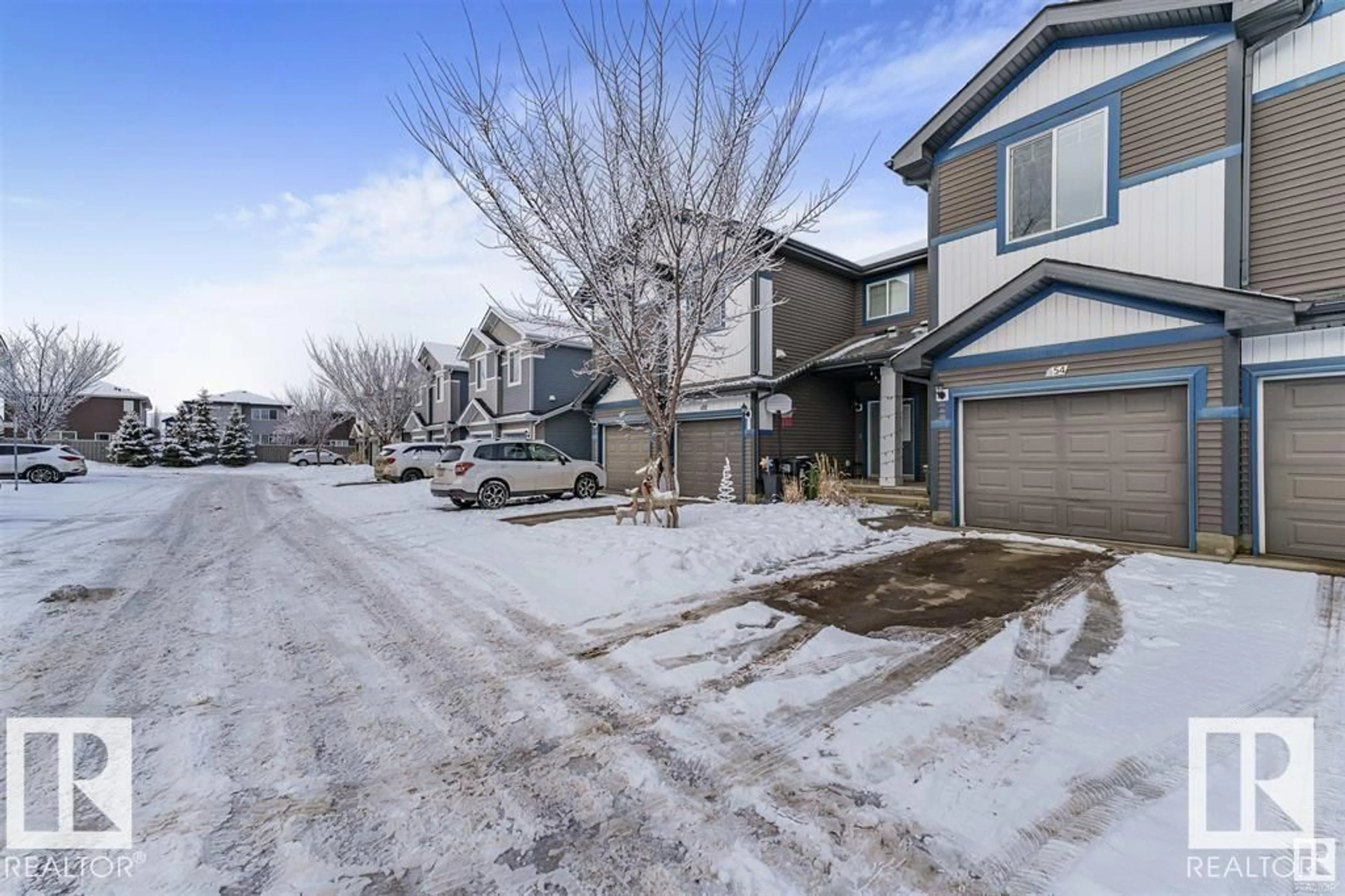 A pic from outside/outdoor area/front of a property/back of a property/a pic from drone, street for 8209 - 54 217 ST, Edmonton Alberta T5T6Z4