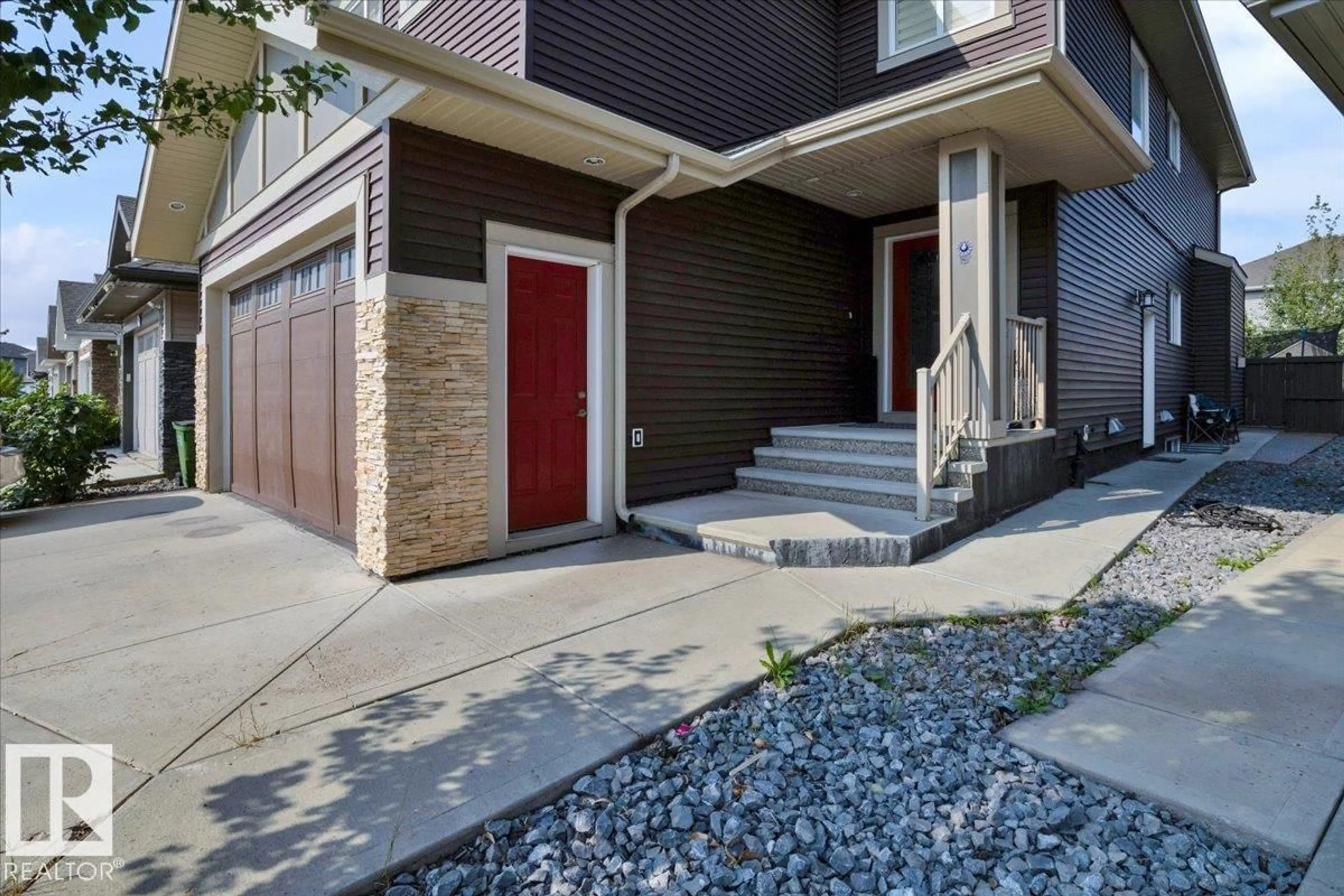 Home with brick exterior material, street for 7020 173 AV, Edmonton Alberta T5Z0M8