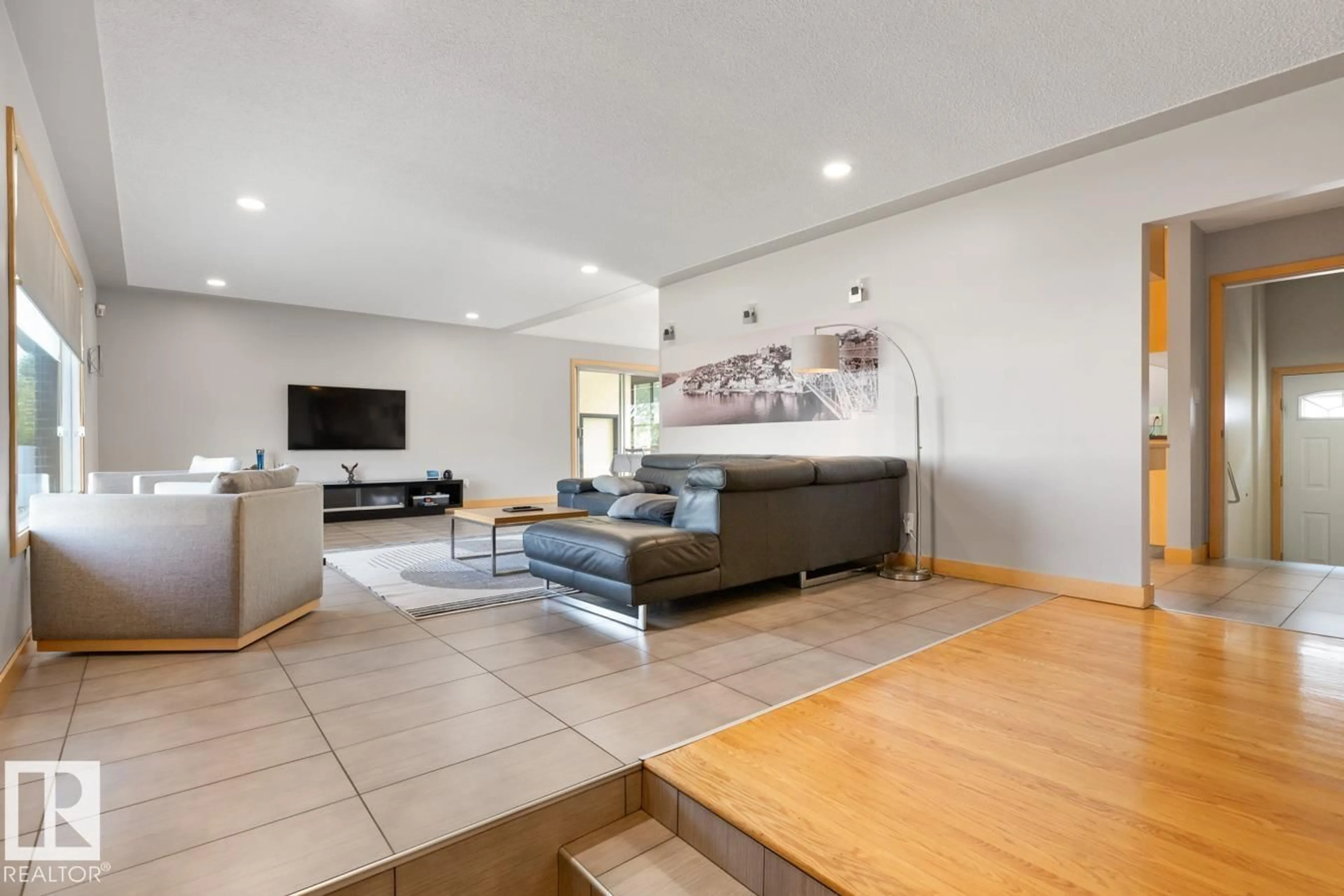 Living room with furniture, unknown for 8007 128 AV, Edmonton Alberta T5C1T8