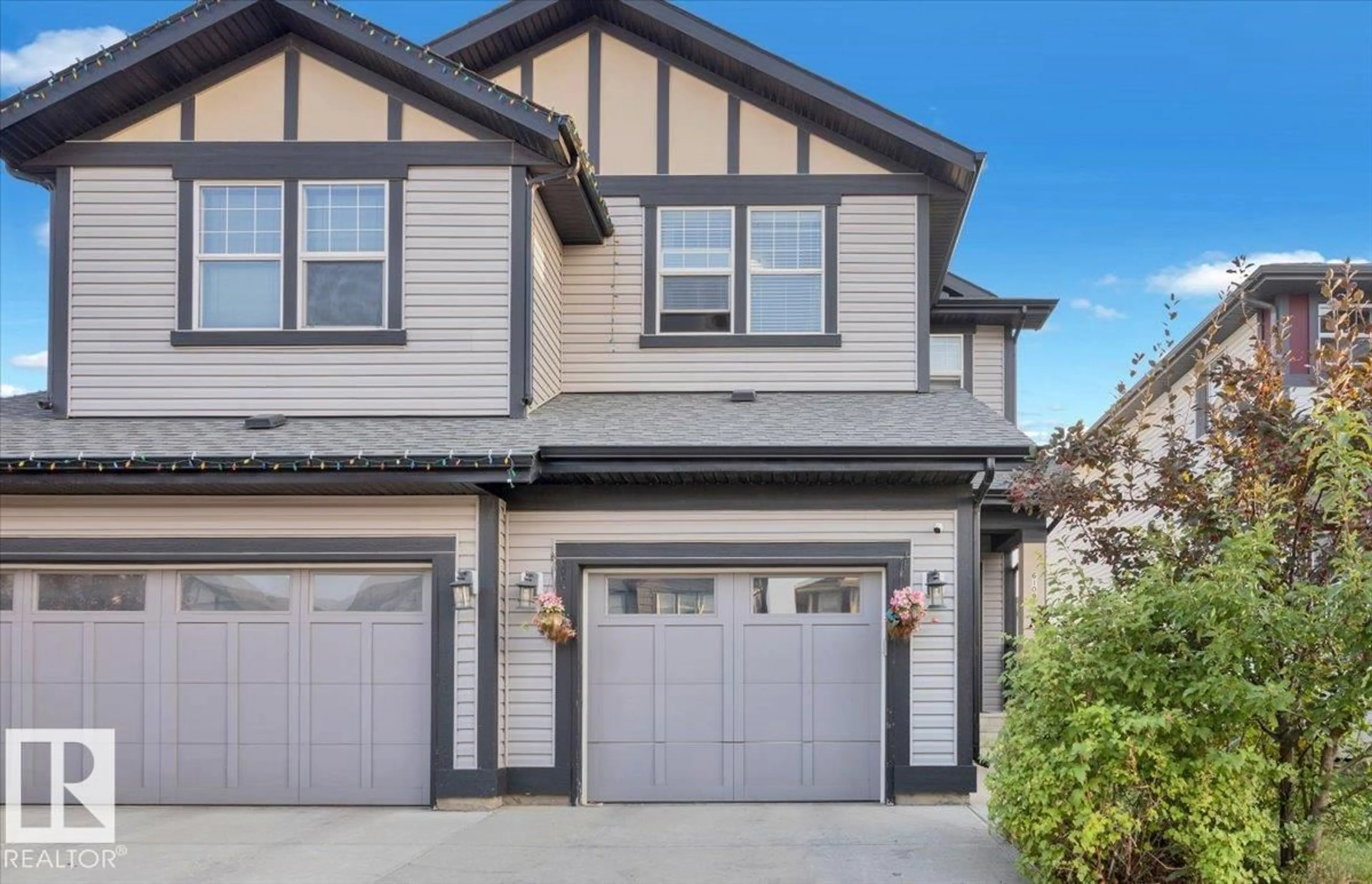Home with vinyl exterior material, street for NW - 6109 176 AV, Edmonton Alberta T5Y3N8