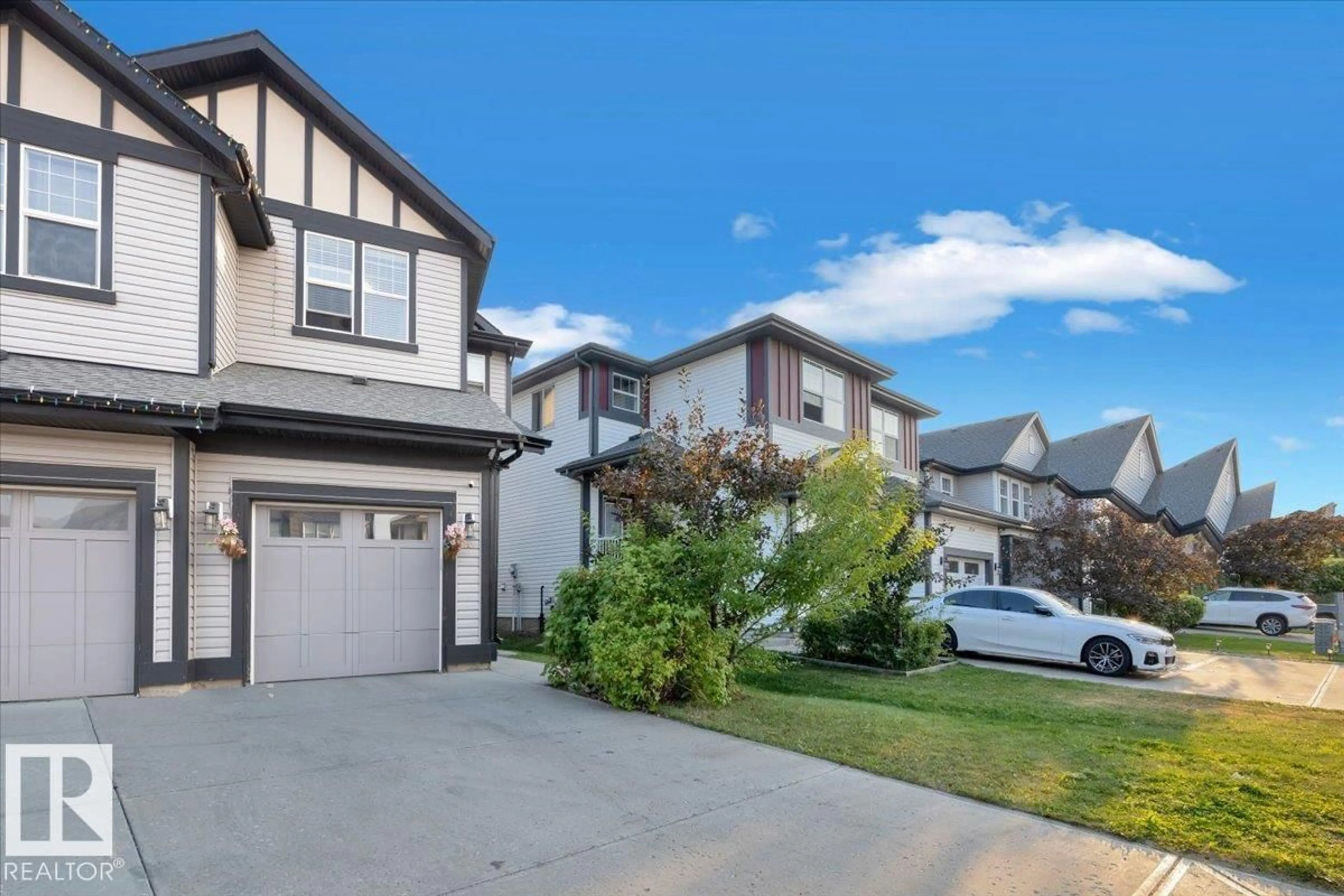 Home with vinyl exterior material, street for NW - 6109 176 AV, Edmonton Alberta T5Y3N8