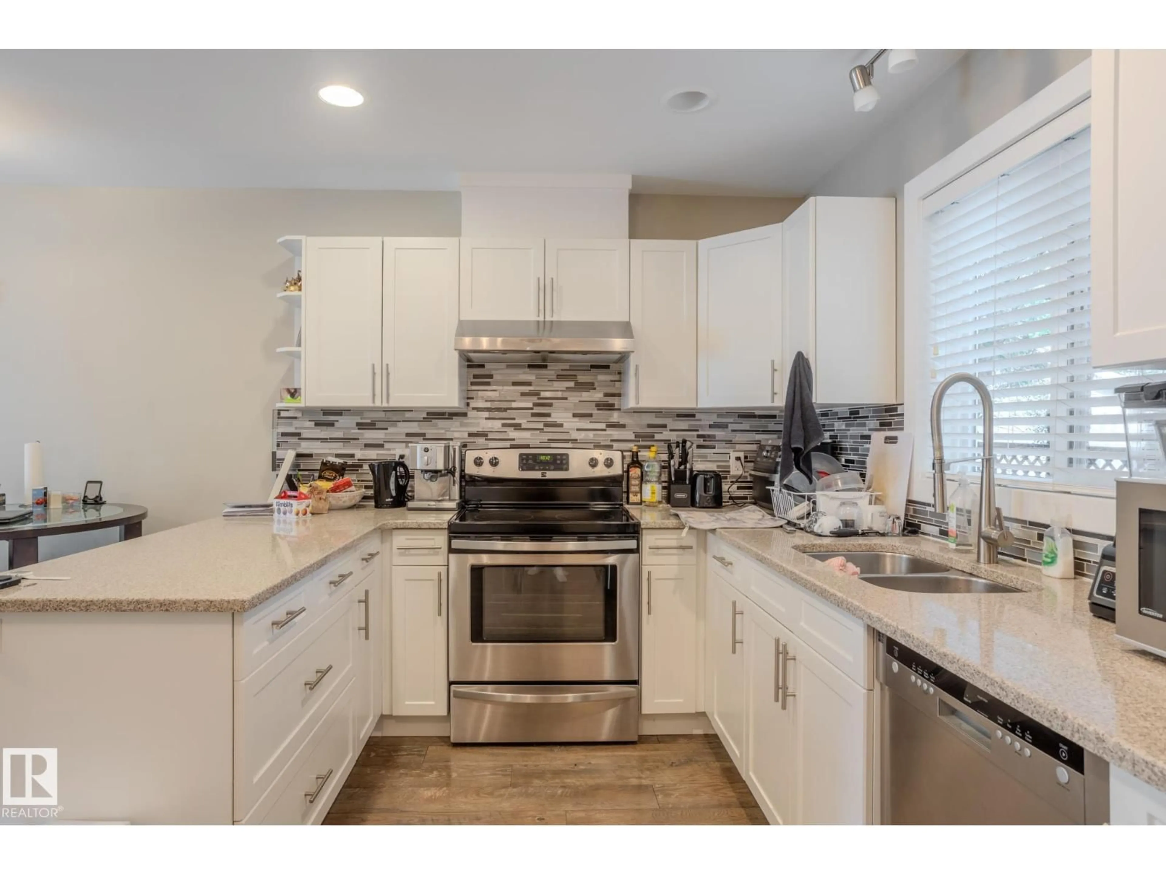 Open concept kitchen, unknown for 12504 119 AV, Edmonton Alberta T5L2Z5