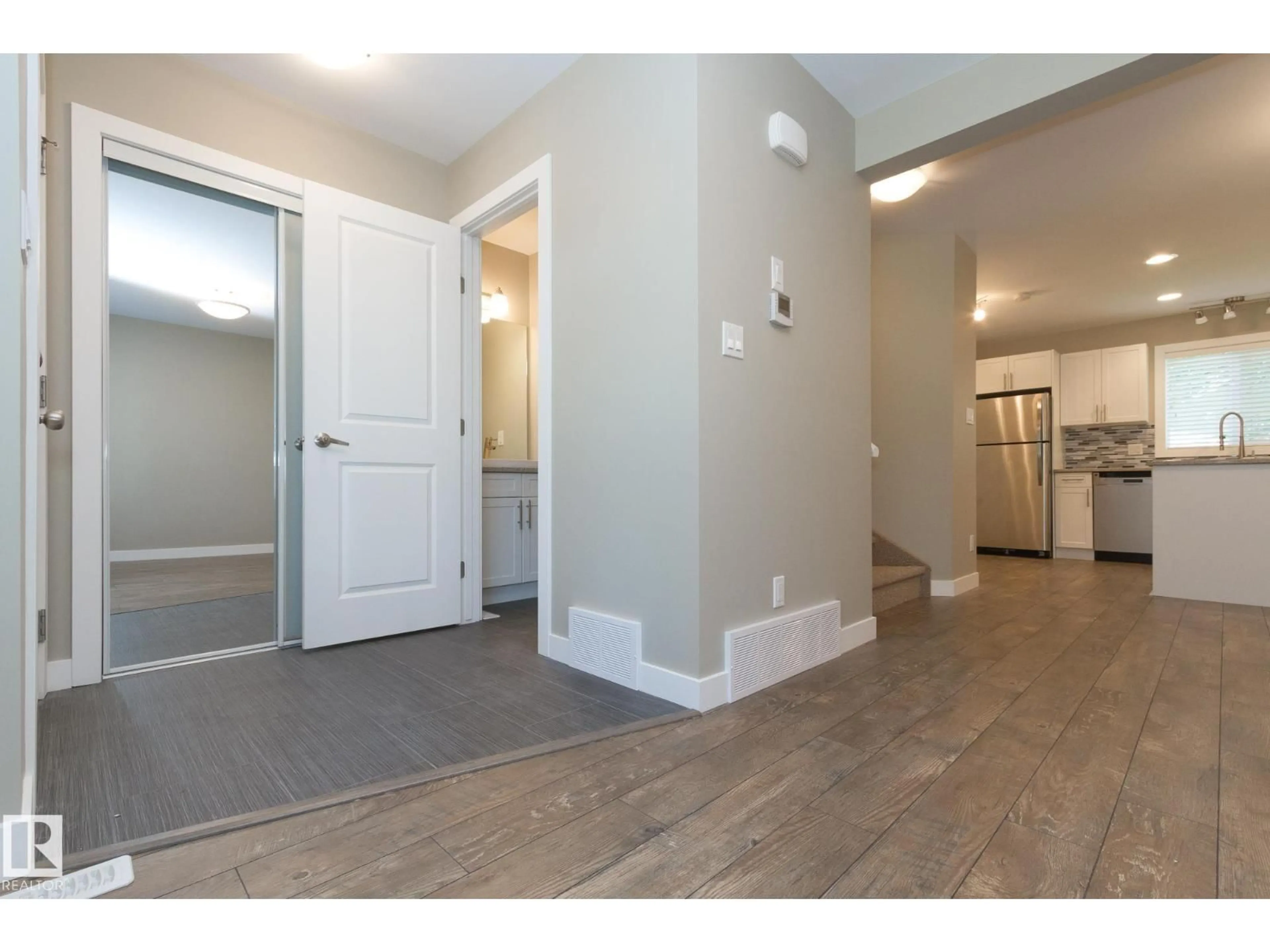 Indoor entryway for 12504 119 AV, Edmonton Alberta T5L2Z5