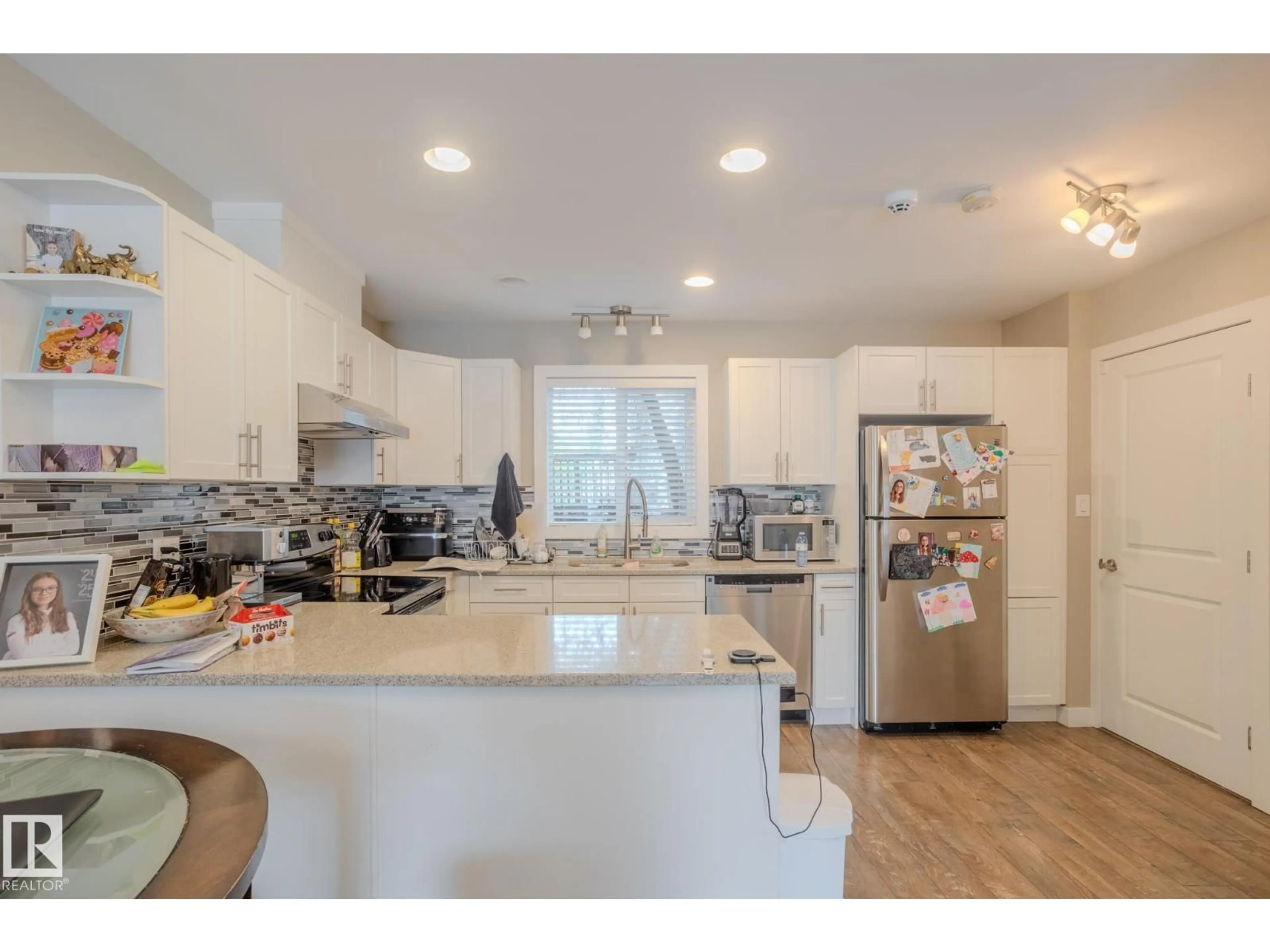 Open concept kitchen, unknown for 12504 119 AV, Edmonton Alberta T5L2Z5
