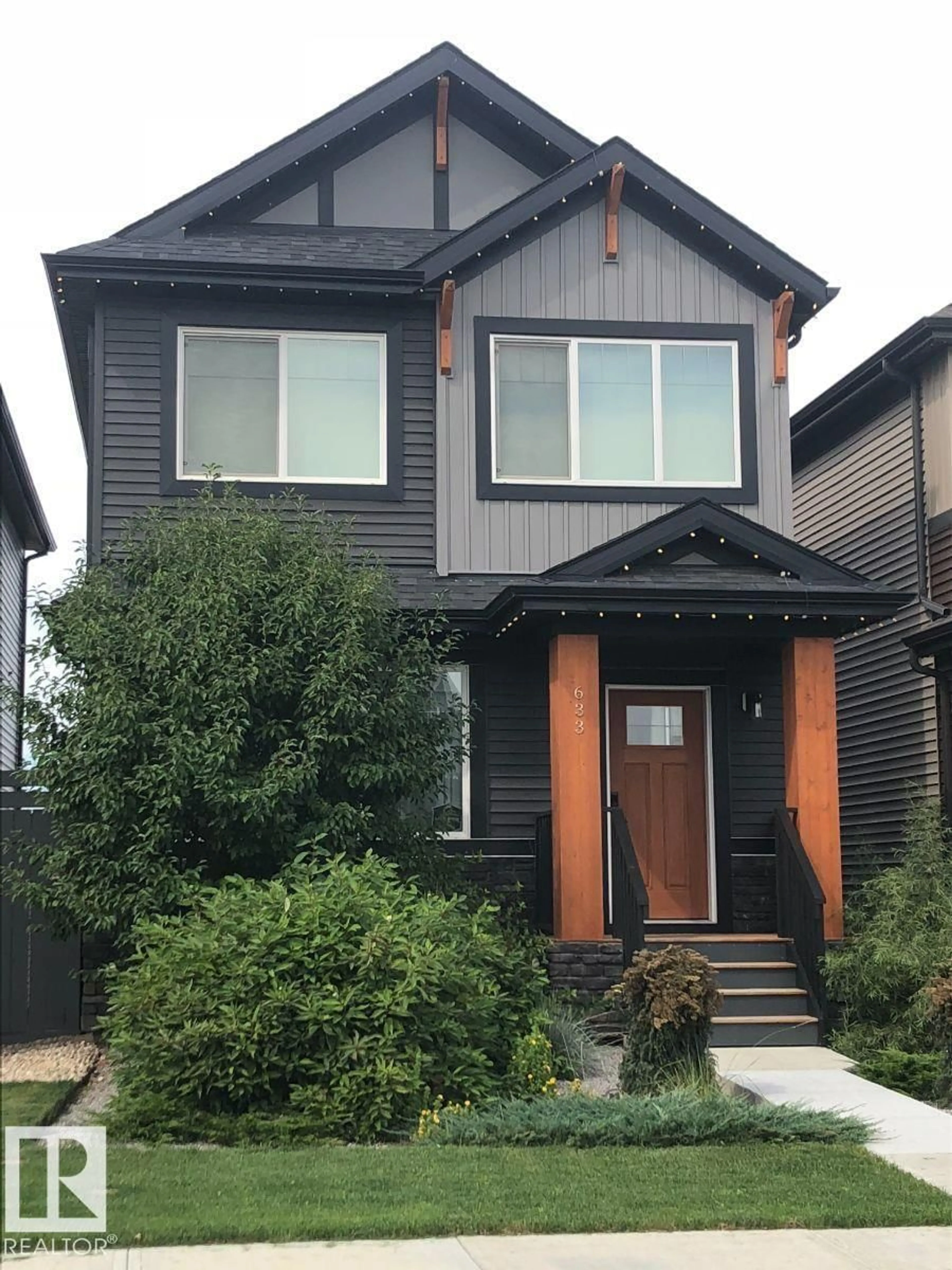 Home with vinyl exterior material, street for 633 MERLIN LD, Edmonton Alberta T5S0M1
